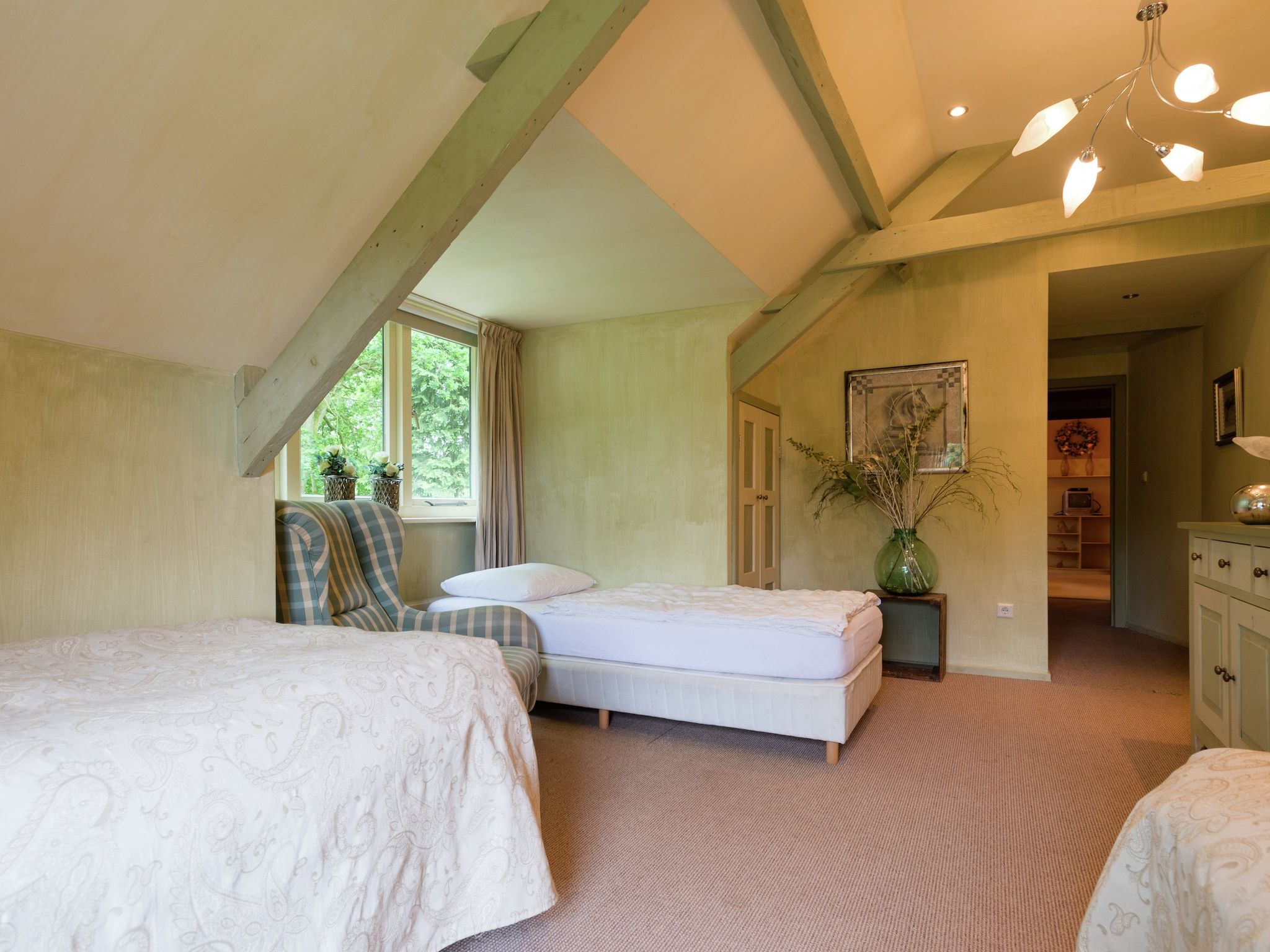 Een slaapkamer van De Eekhorst in Balkbrug