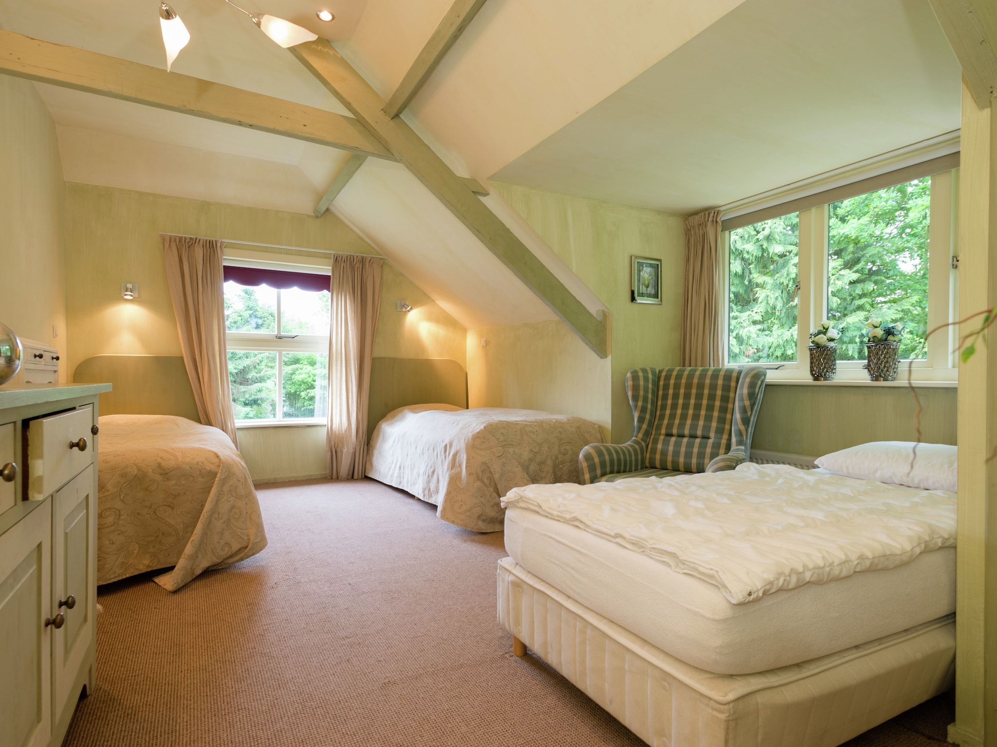 Een slaapkamer van De Eekhorst in Balkbrug