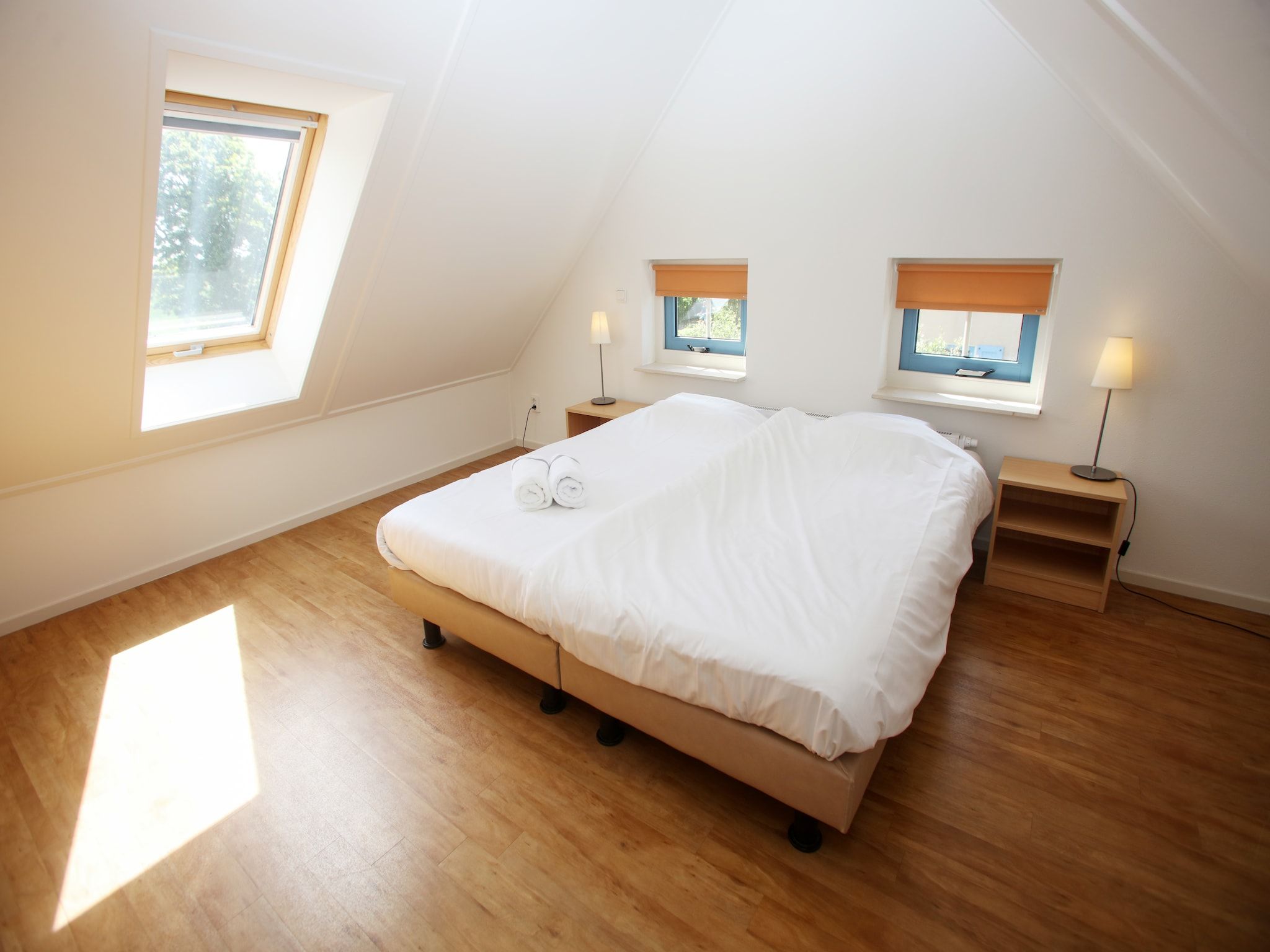 Een slaapkamer van Kustpark Texel 3 in De Koog
