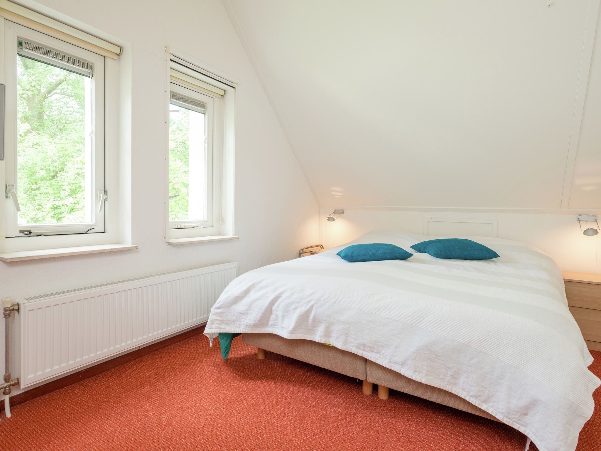 Een slaapkamer van Zonnenberg 34 in Heeten