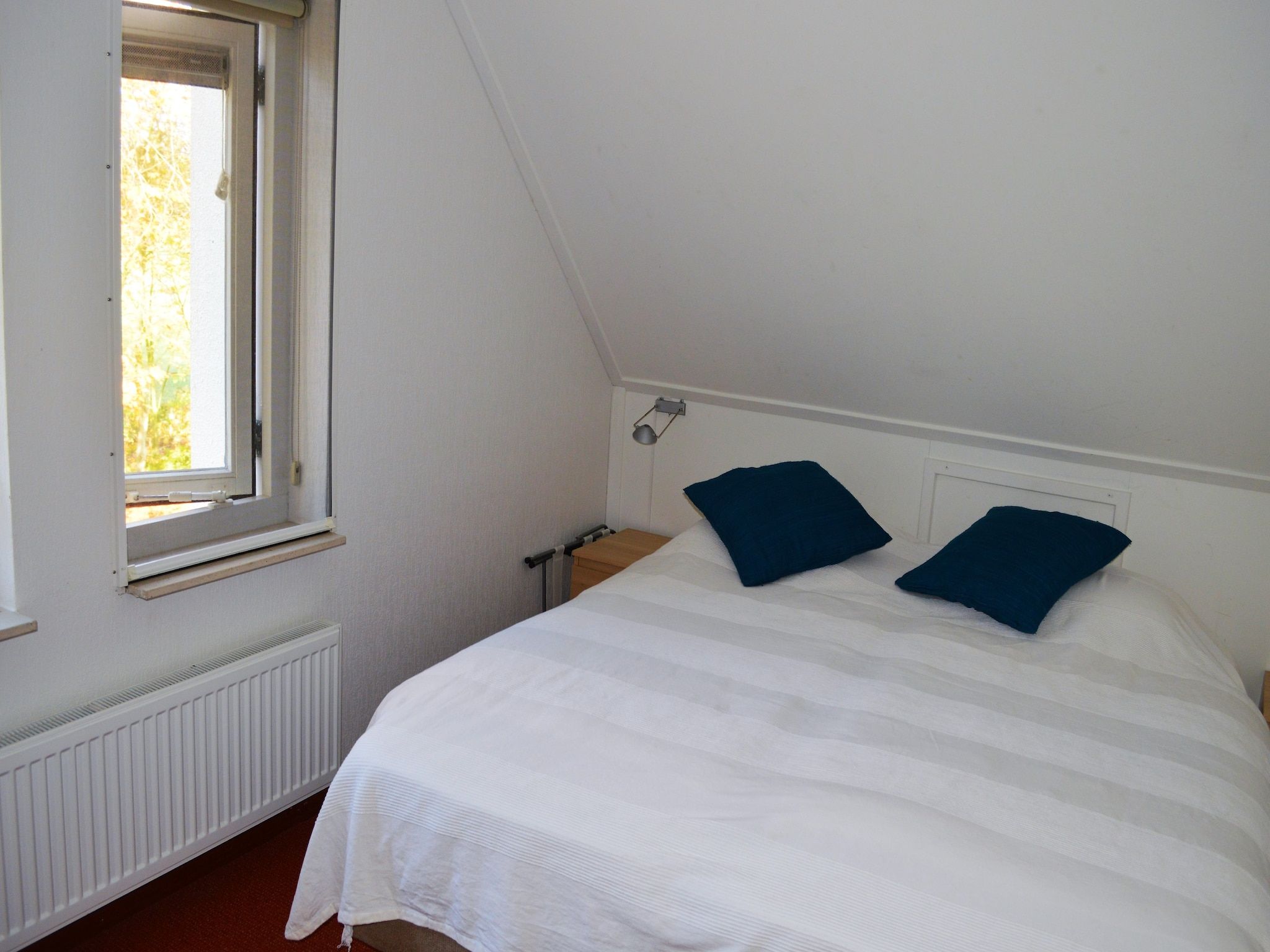 Een slaapkamer van Zonnenberg 34 in Heeten