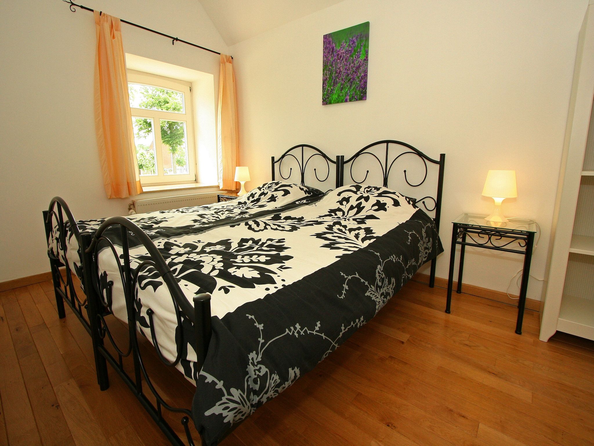 Een slaapkamer van Hoeve in gunne winkel 1 en 2 in Wijlre