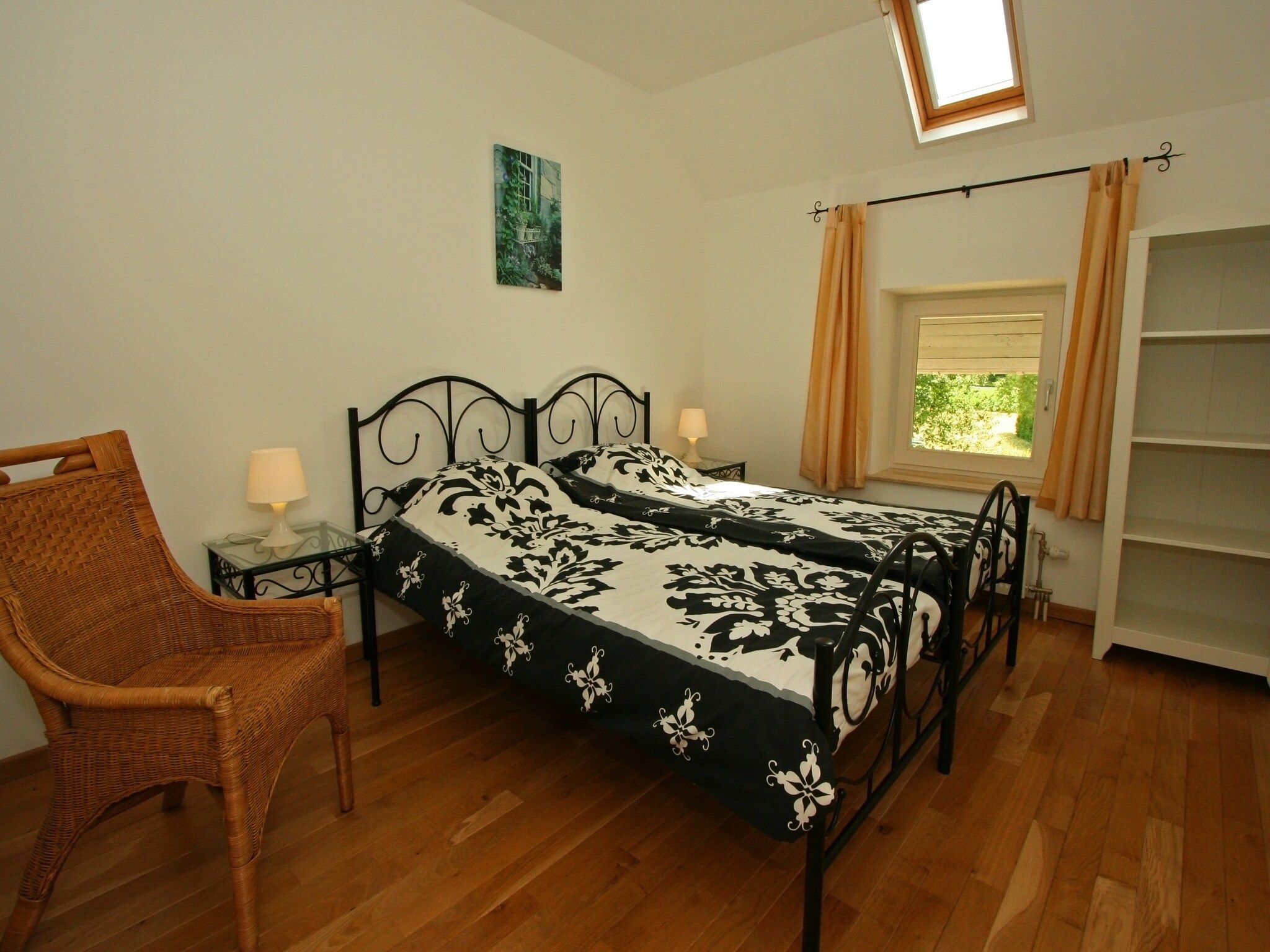 Een slaapkamer van Hoeve in gunne winkel 2 in Wijlre