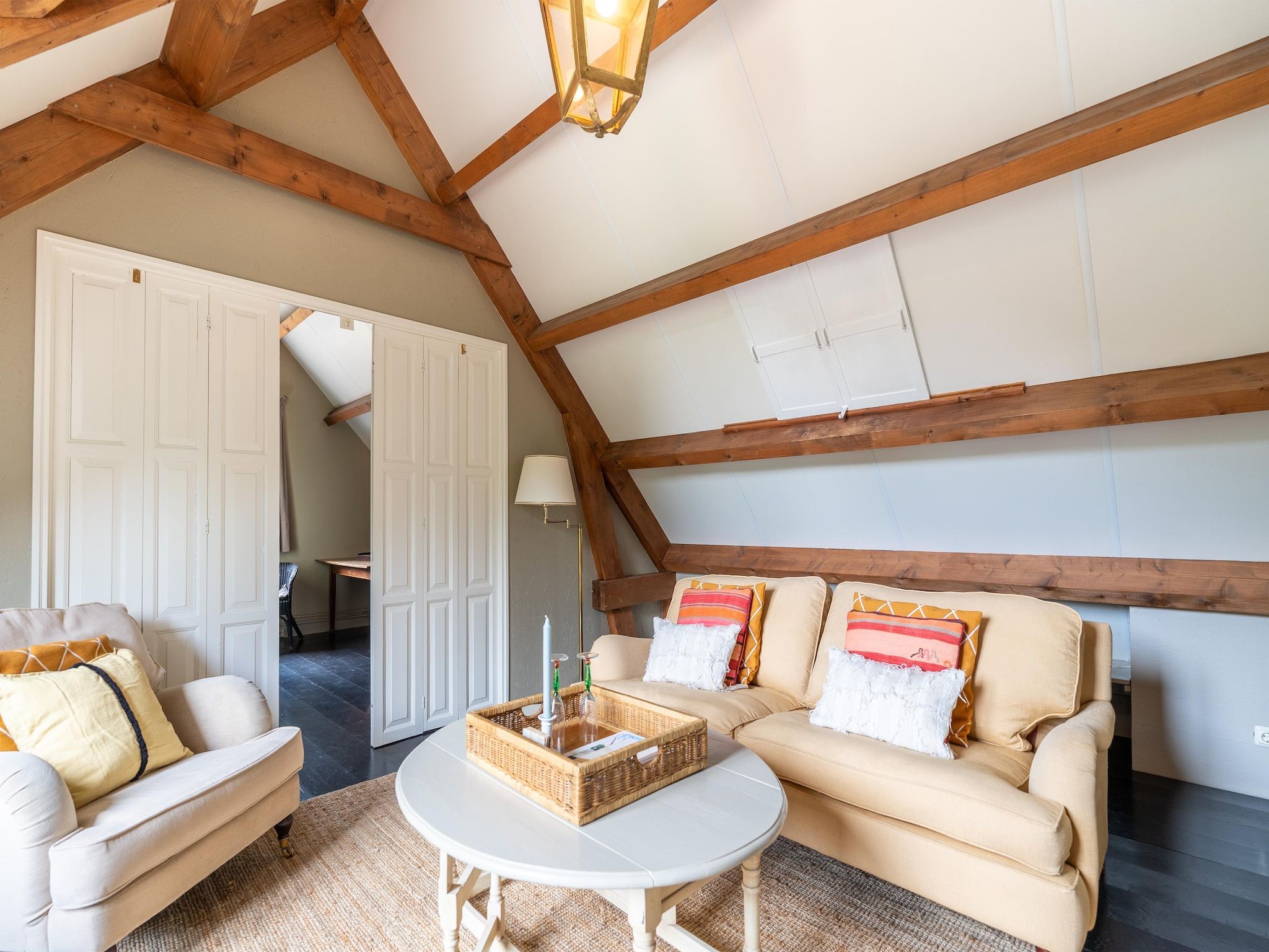 De woonkamer van Koetshuis 't Geyn-Landgoed Noordenhoek in Deil