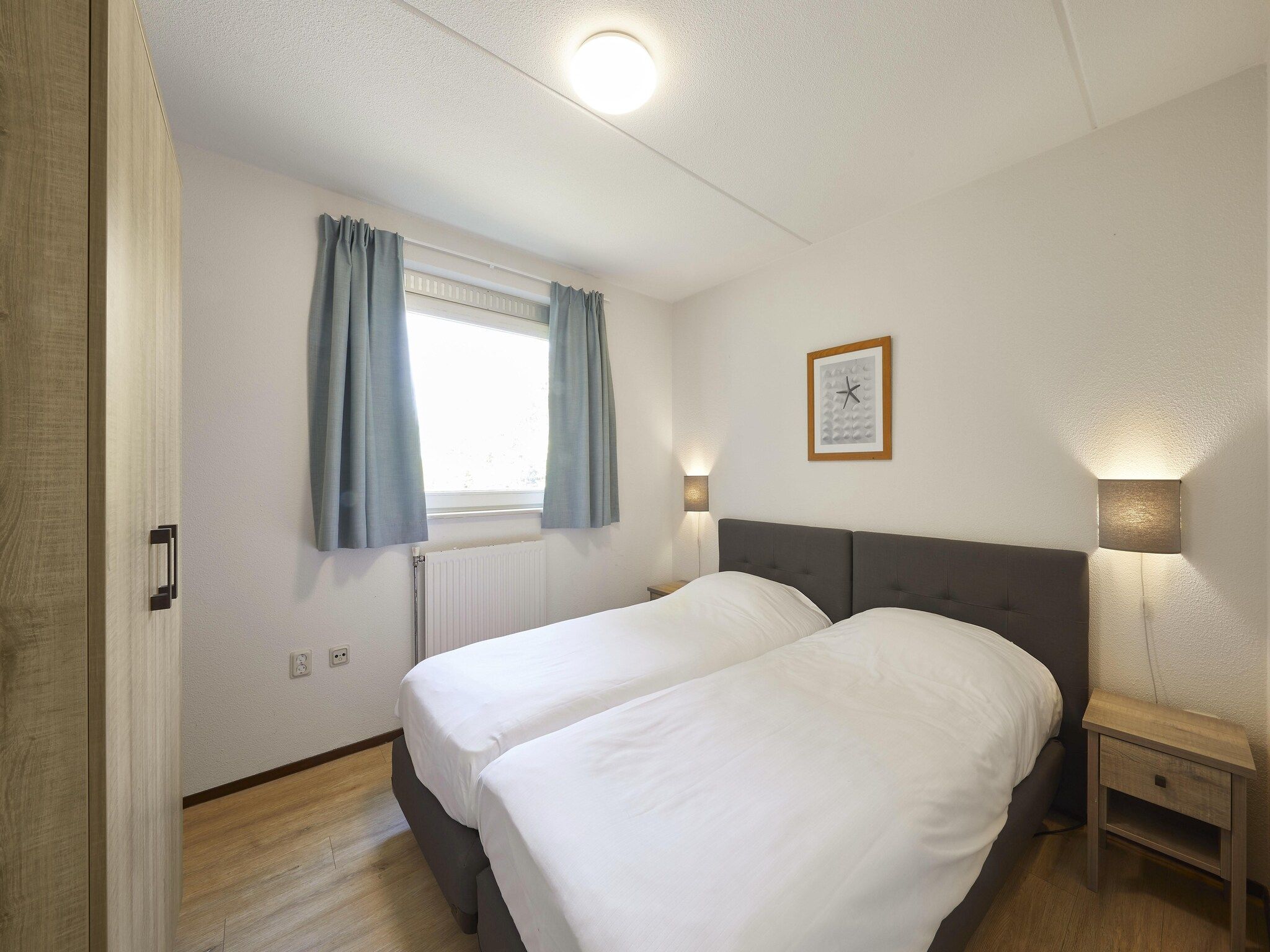 Een slaapkamer van Vakantiepark Kijkduin 2 in Den Haag