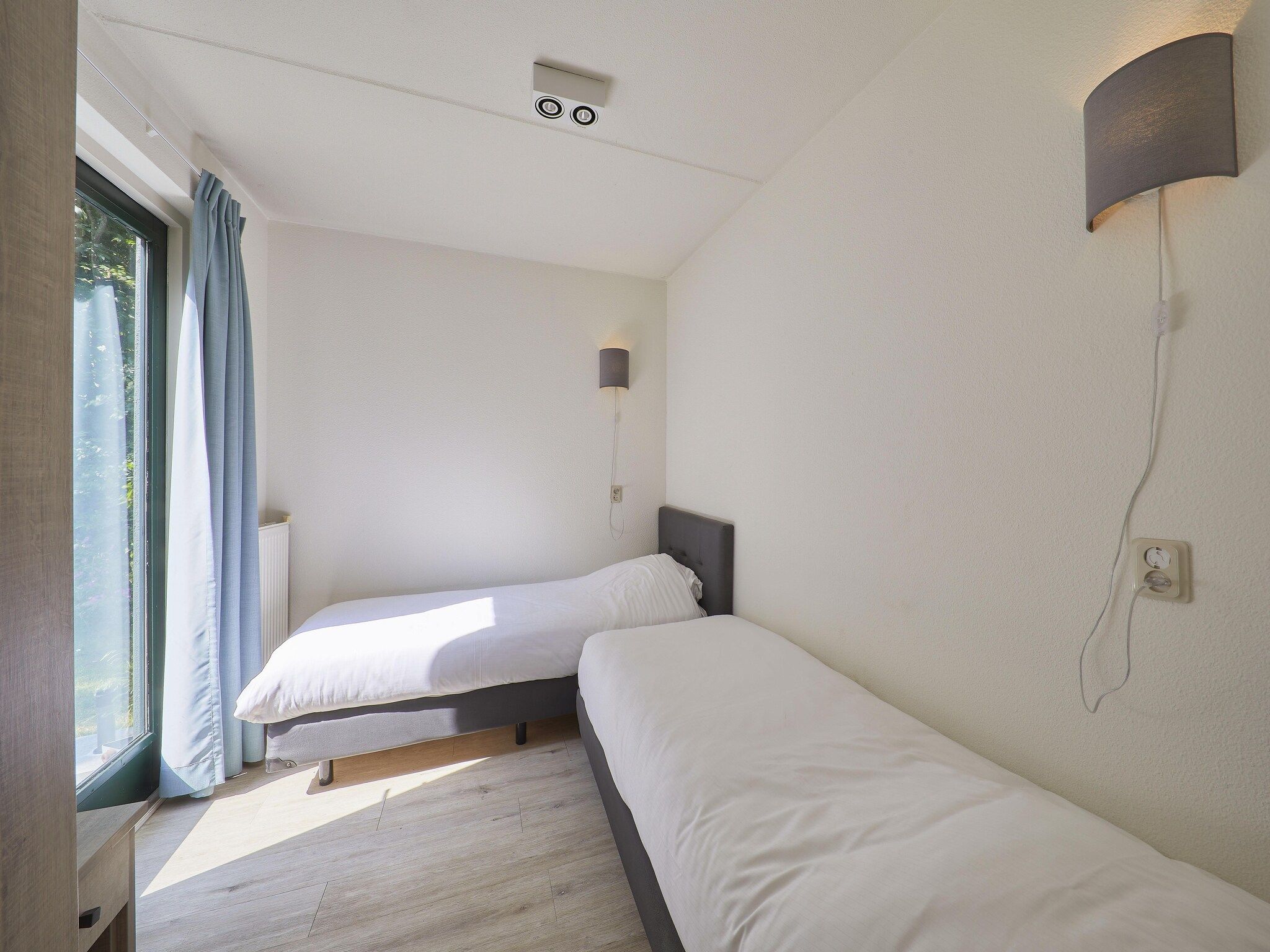 Een slaapkamer van Vakantiepark Kijkduin 2 in Den Haag