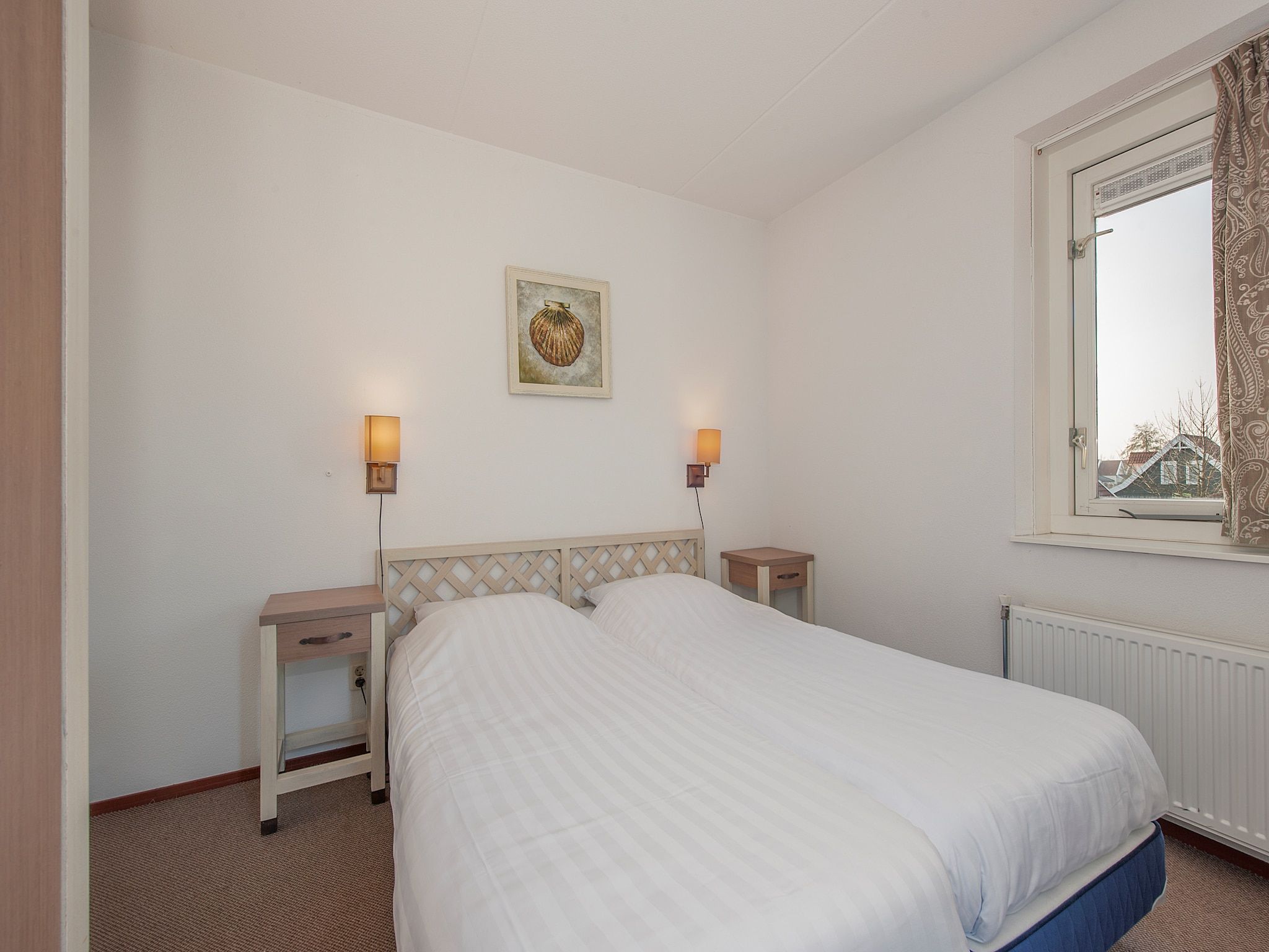 Een slaapkamer van Aquadelta 13 in Bruinisse