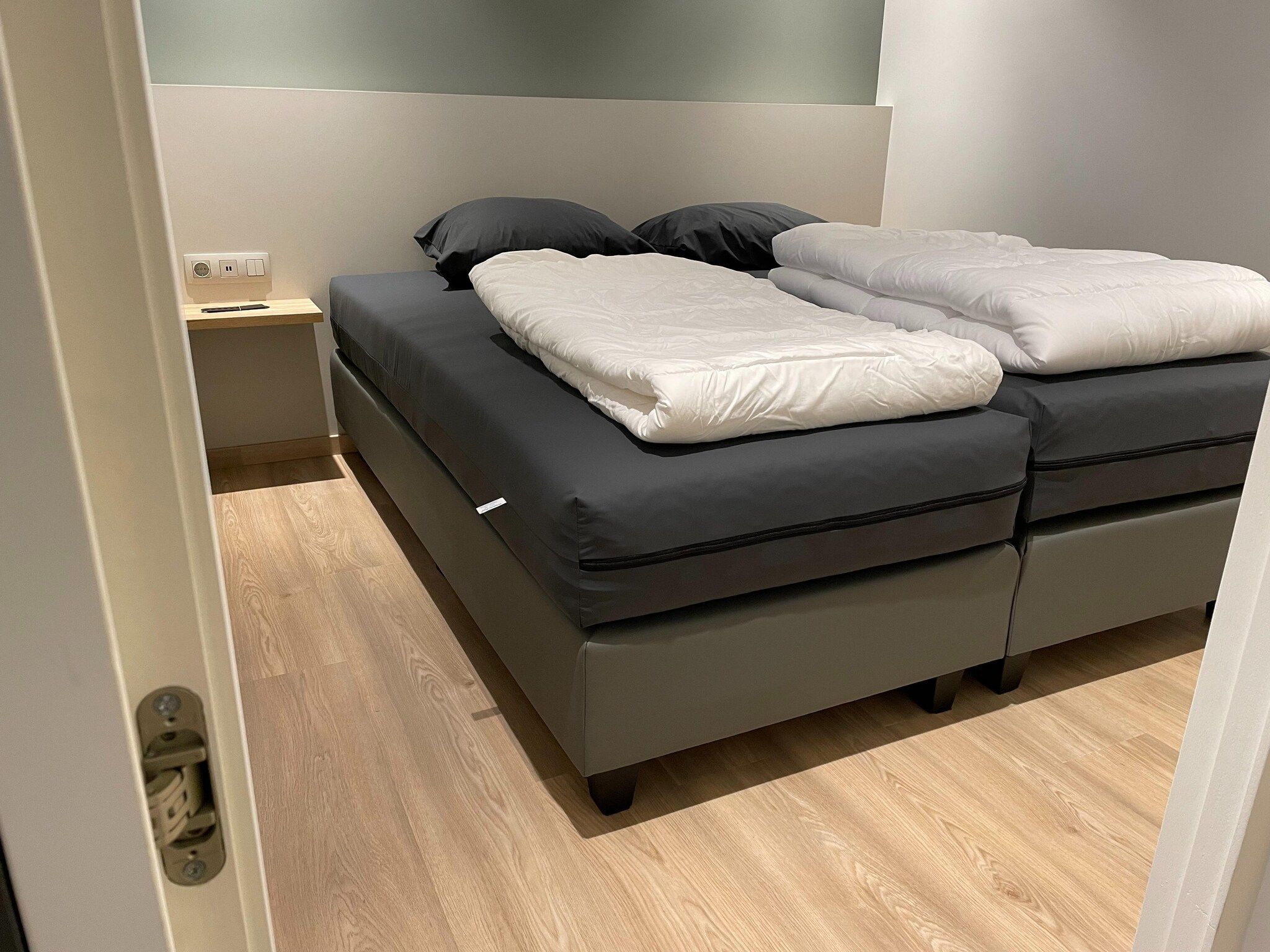 Een slaapkamer van Het Platte Putje - Huisdiervrij - nr4 in Groede