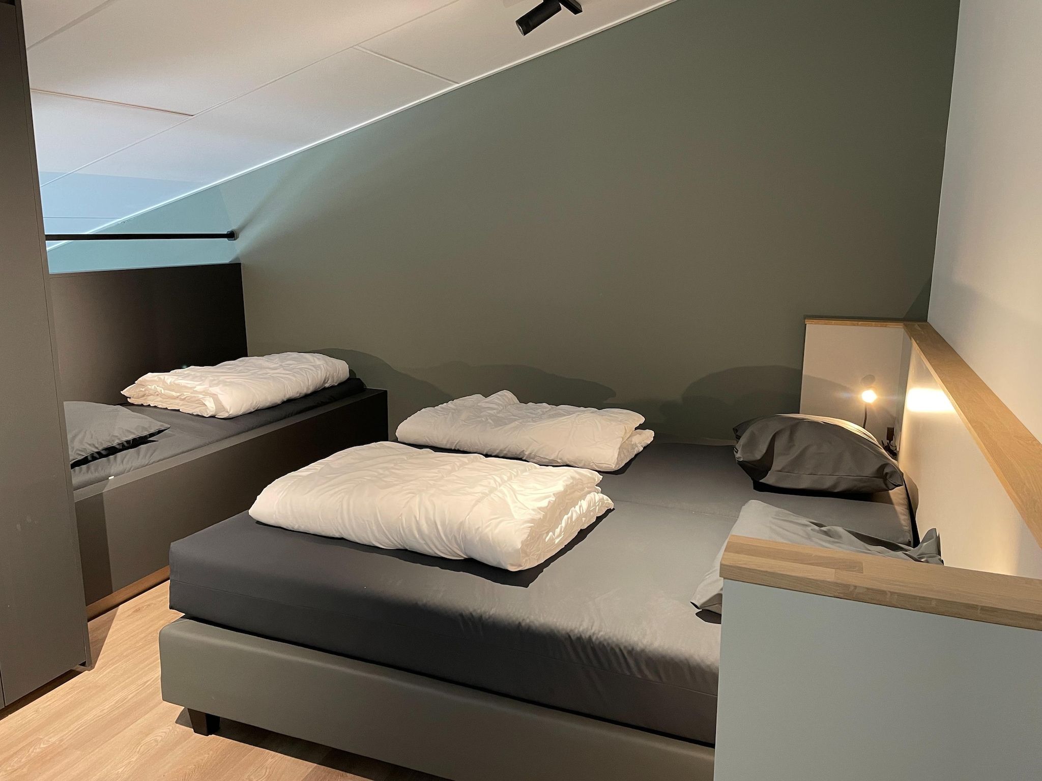 Een slaapkamer van Het Platte Putje - Huisdiervrij - nr4 in Groede