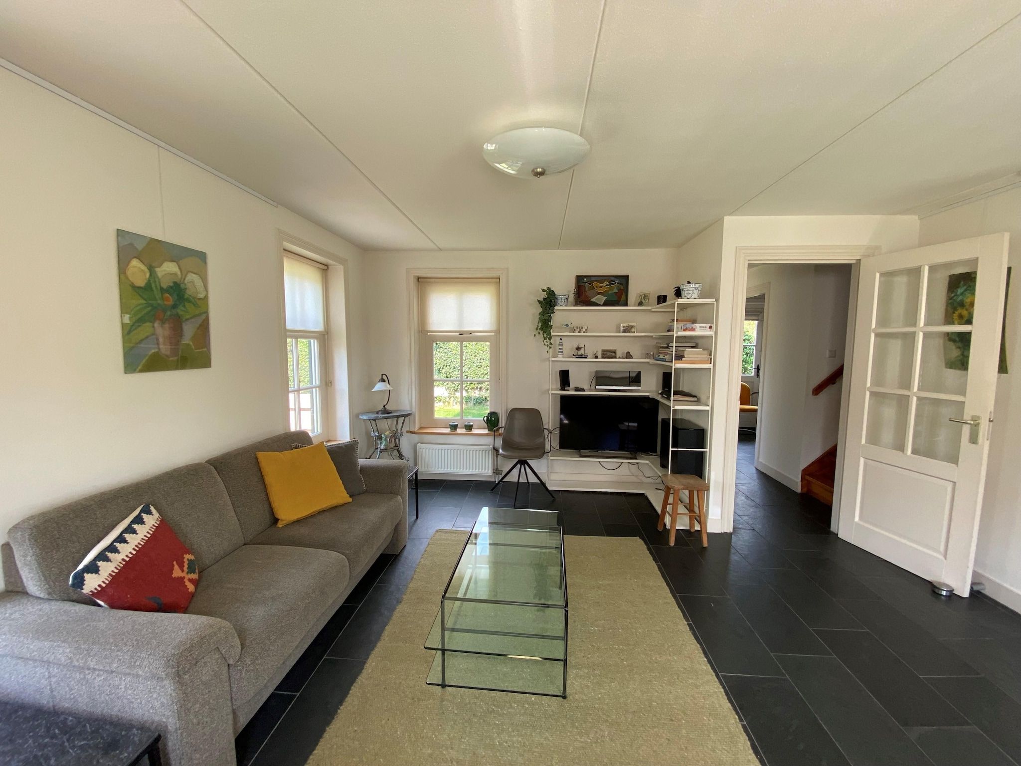 De woonkamer van Recreatiepark Wiringherlant  - Villa 10 in Hippolytushoef