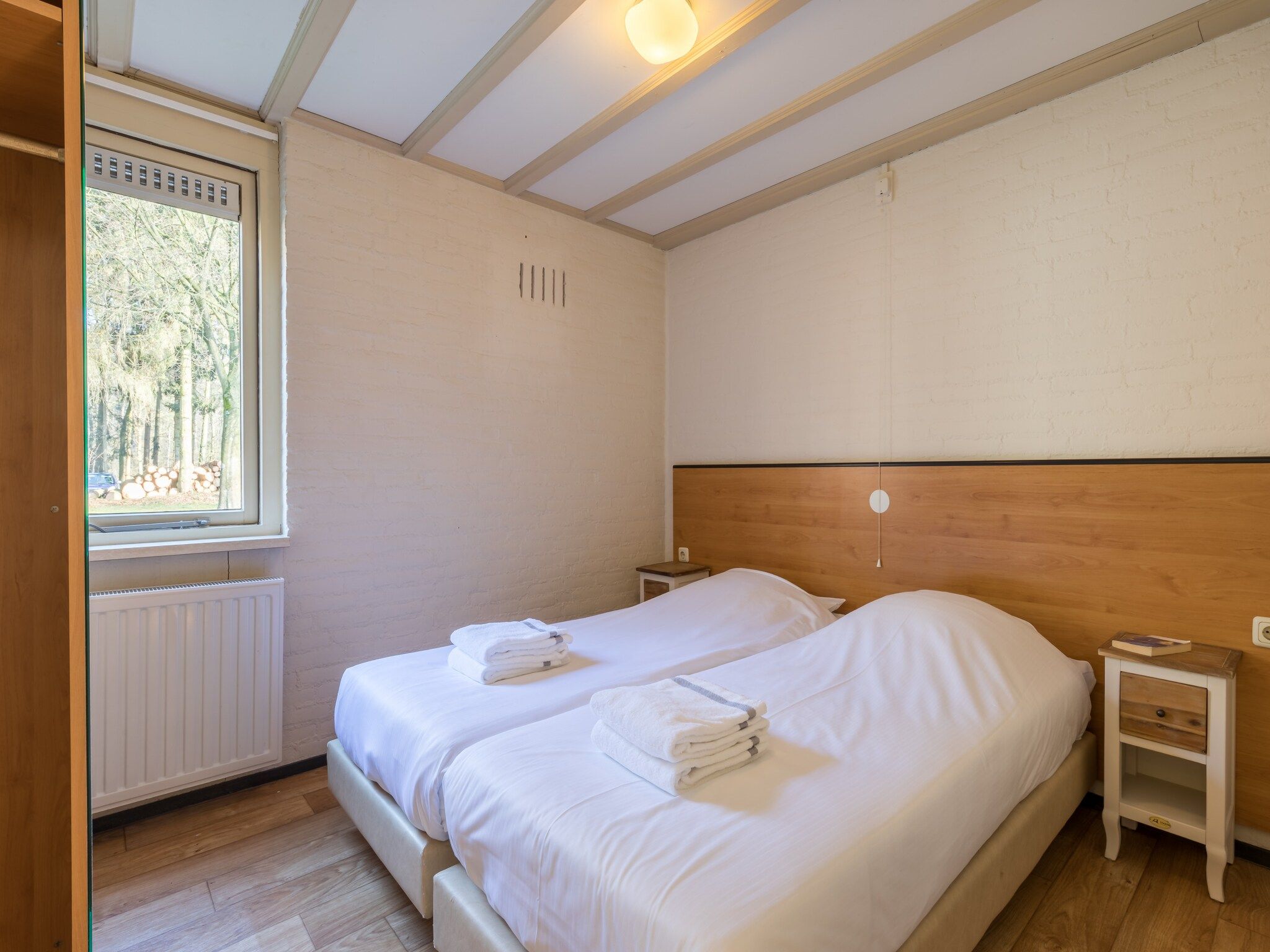 Een slaapkamer van Vakantiepark Klein Vink 14 in Arcen