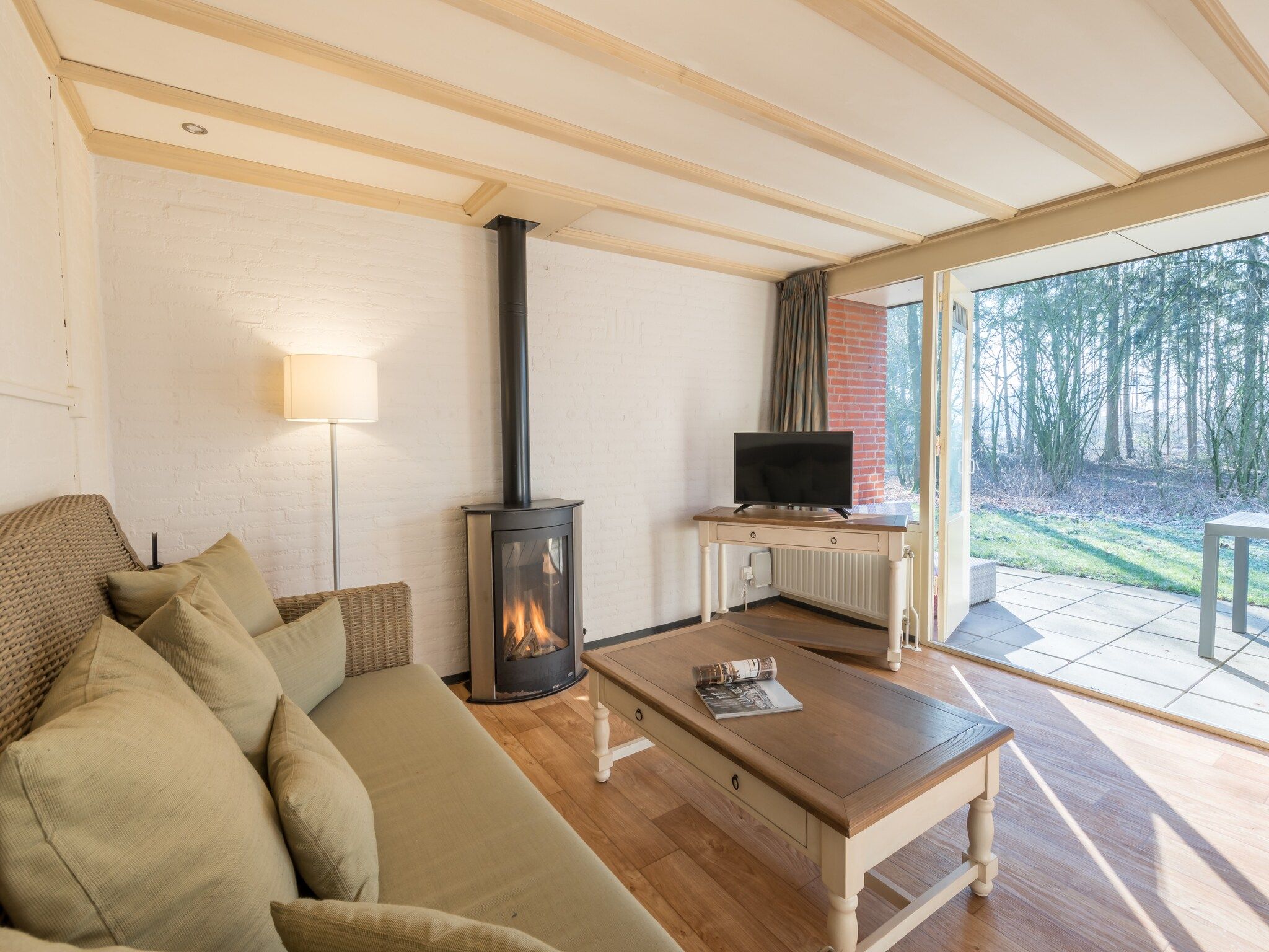 De woonkamer van Vakantiepark Klein Vink 14 in Arcen