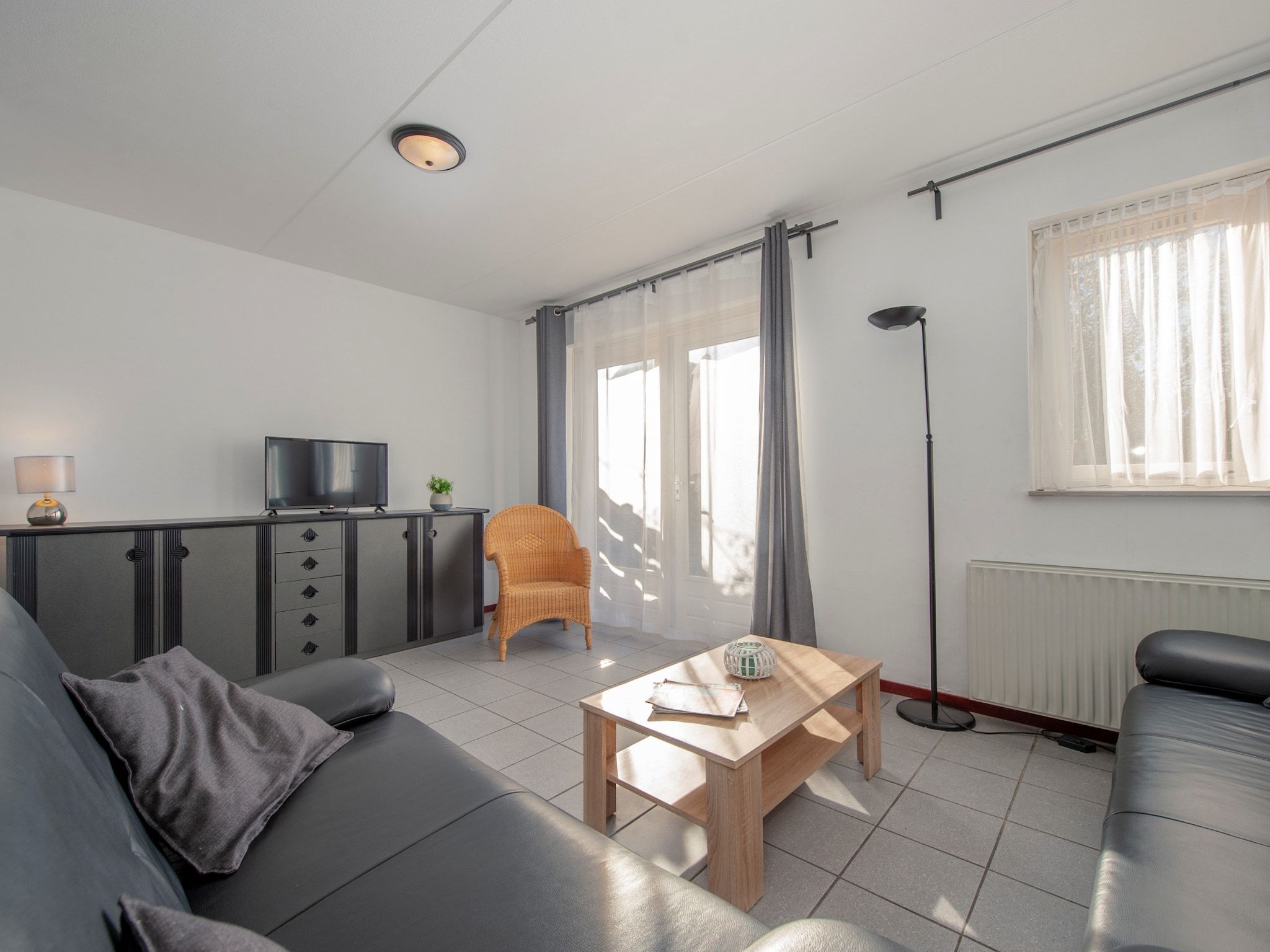 De woonkamer van Vakantiepark Zeebad 2 in Breskens