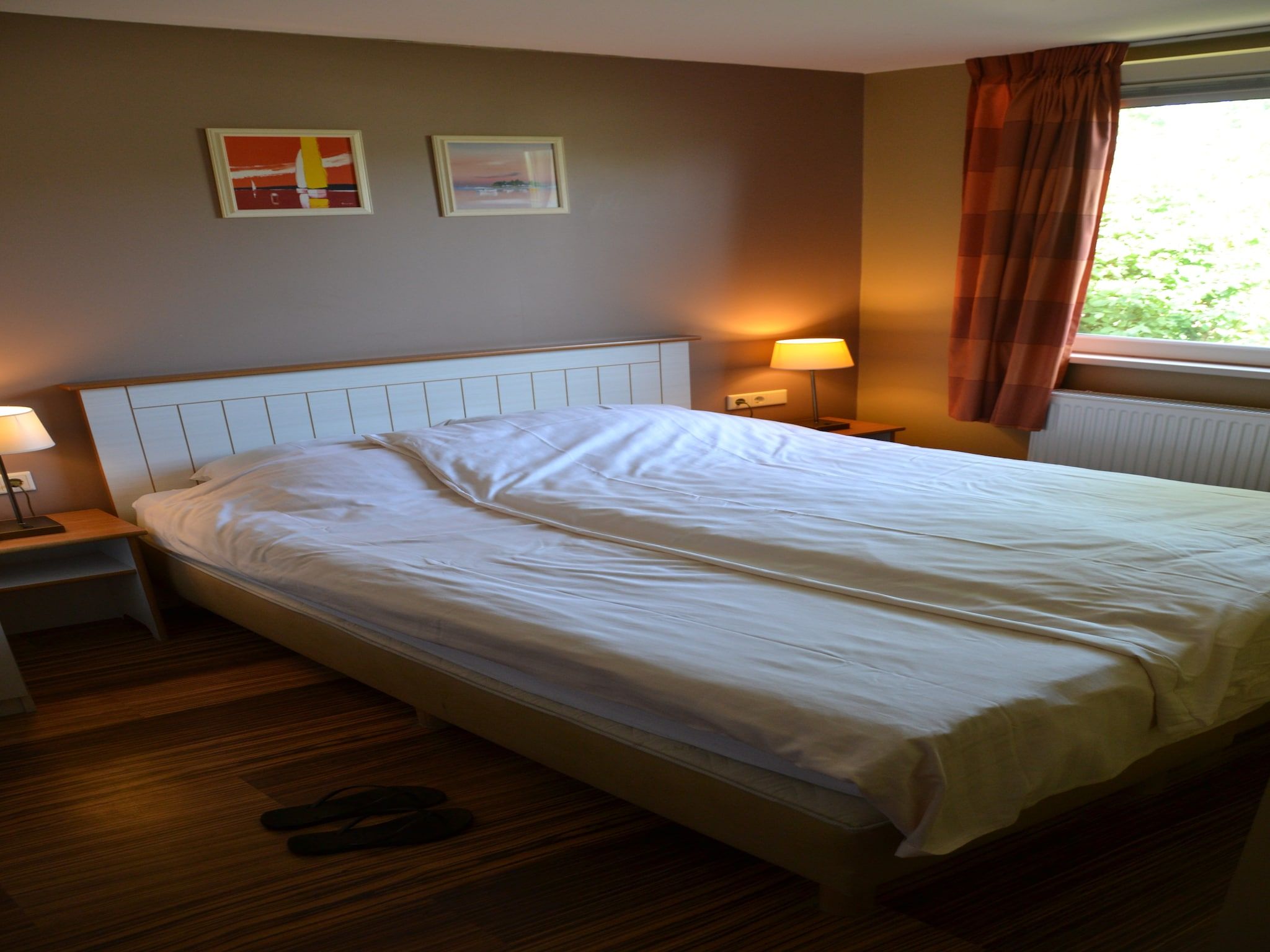 Een slaapkamer van Strandpark Vlugtenburg 6 in 's-Gravenzande