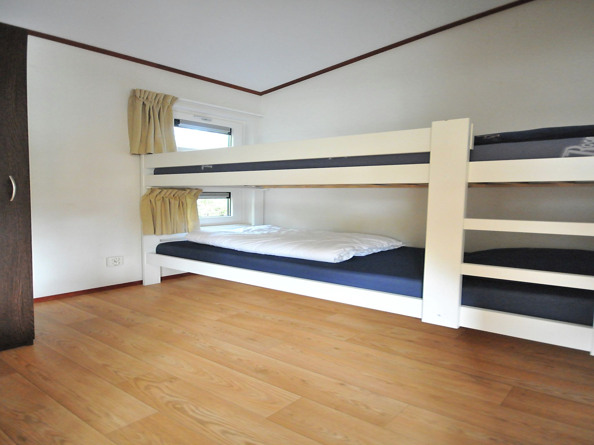 Een slaapkamer van Kustpark Egmond aan Zee 1 in Egmond aan zee