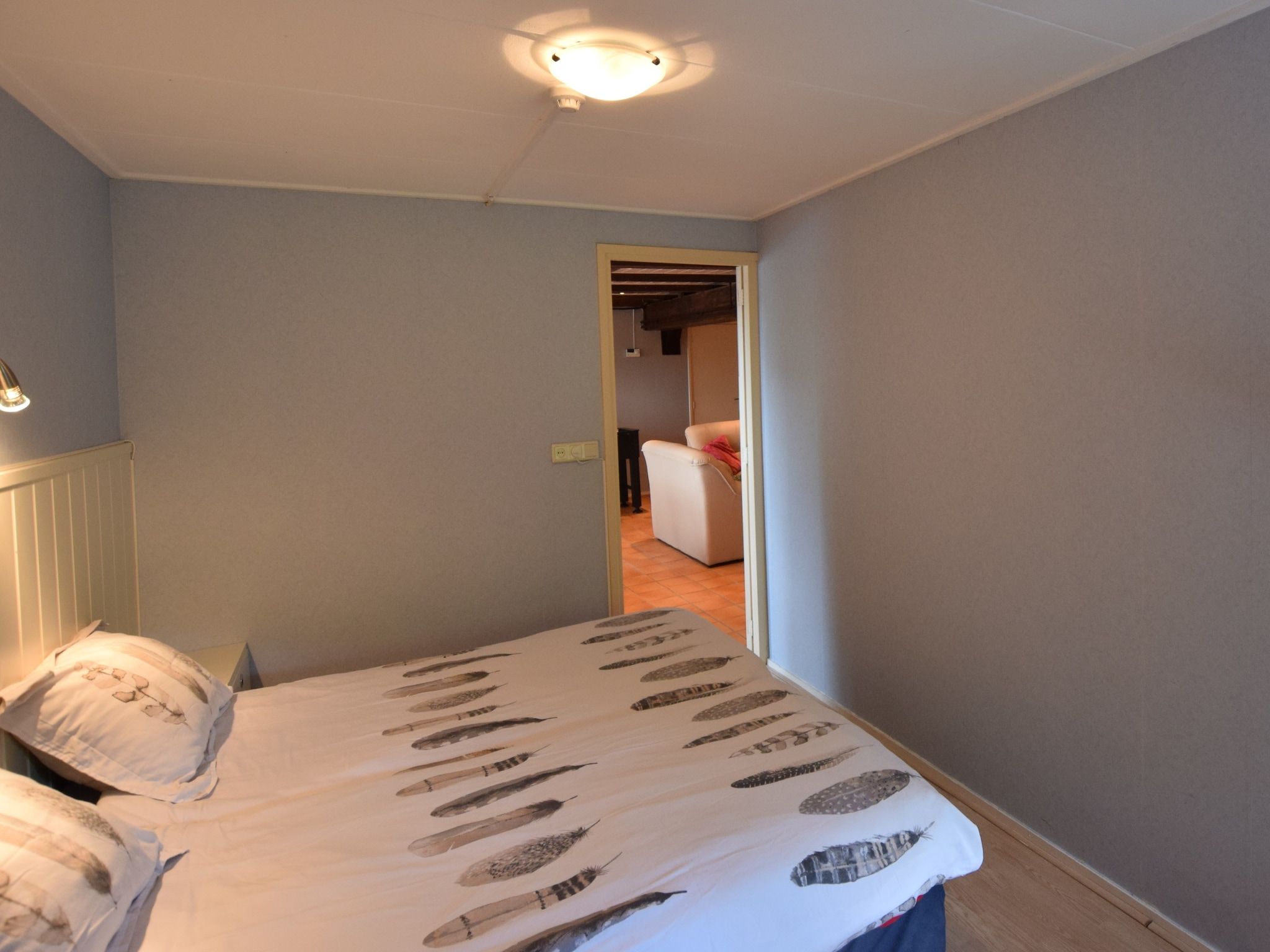 Een slaapkamer van Hoeve Hoogst Tevreden in Leerdam