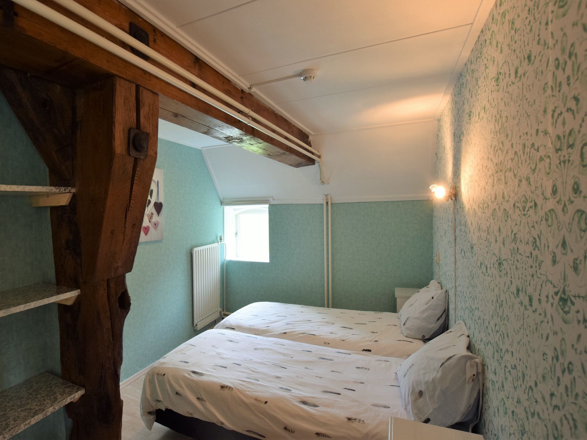 Een slaapkamer van Hoeve Hoogst Tevreden in Leerdam