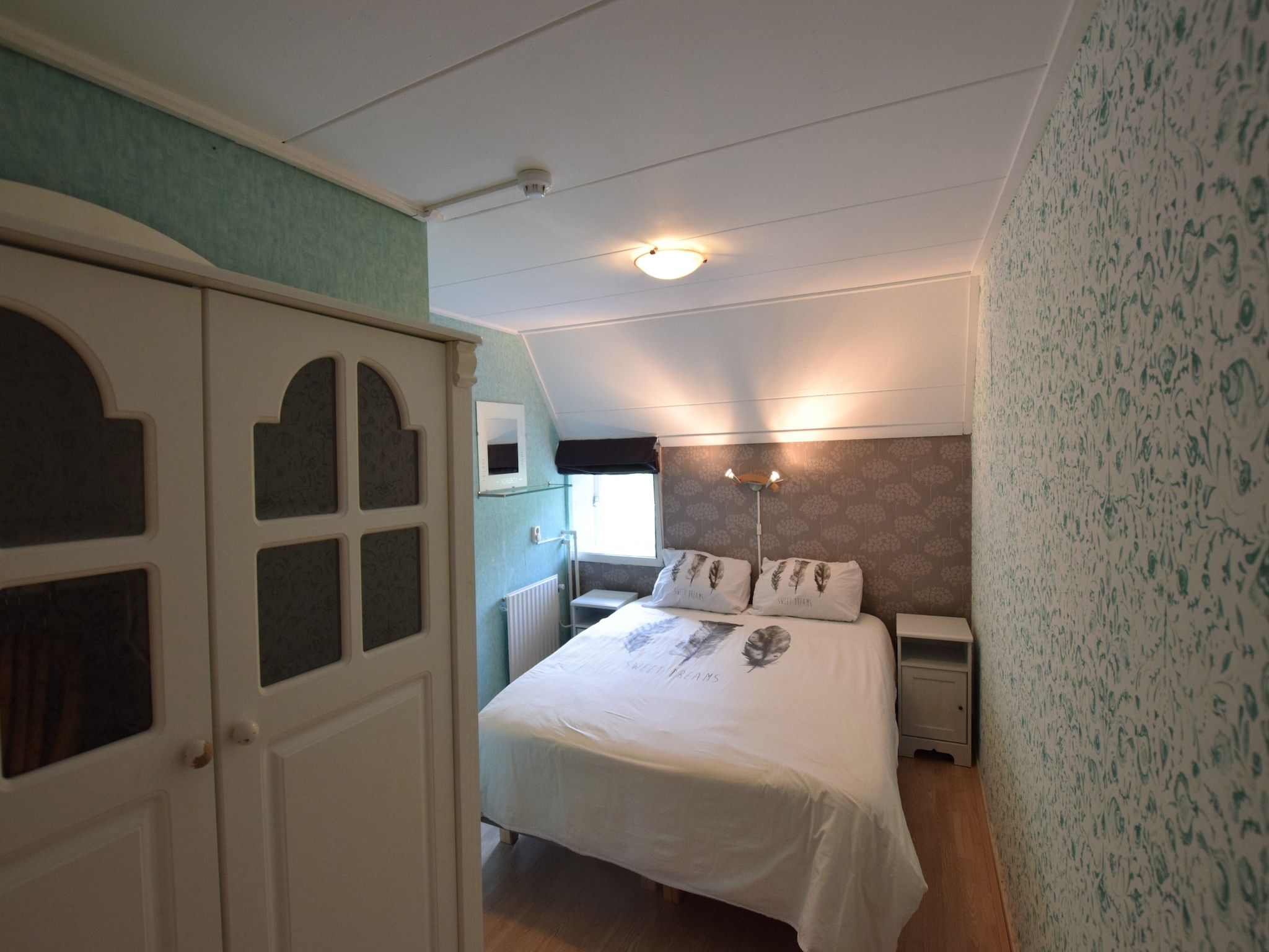 Een slaapkamer van Hoeve Hoogst Tevreden in Leerdam