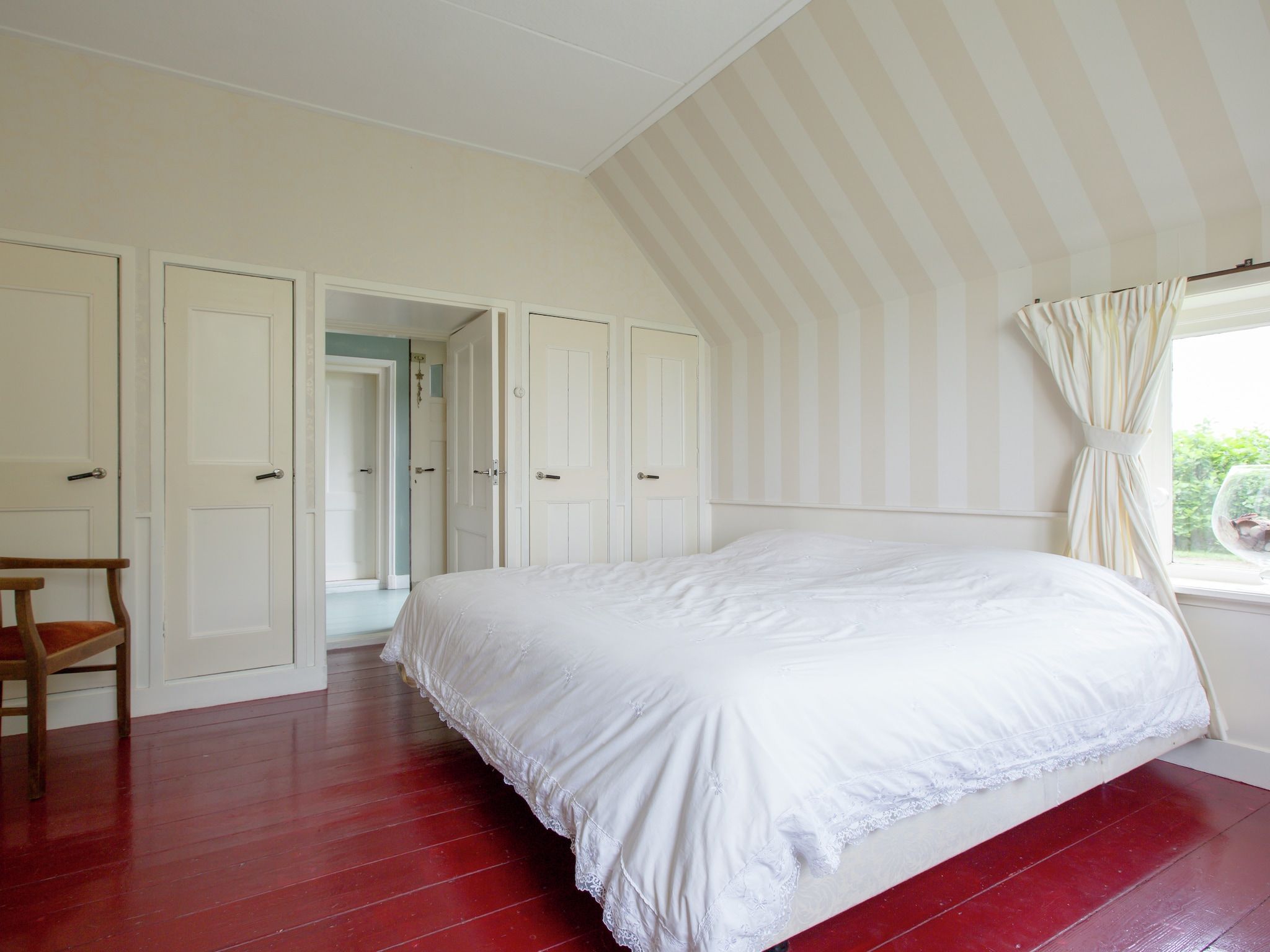 Een slaapkamer van De Goudsbloem in Molkwerum