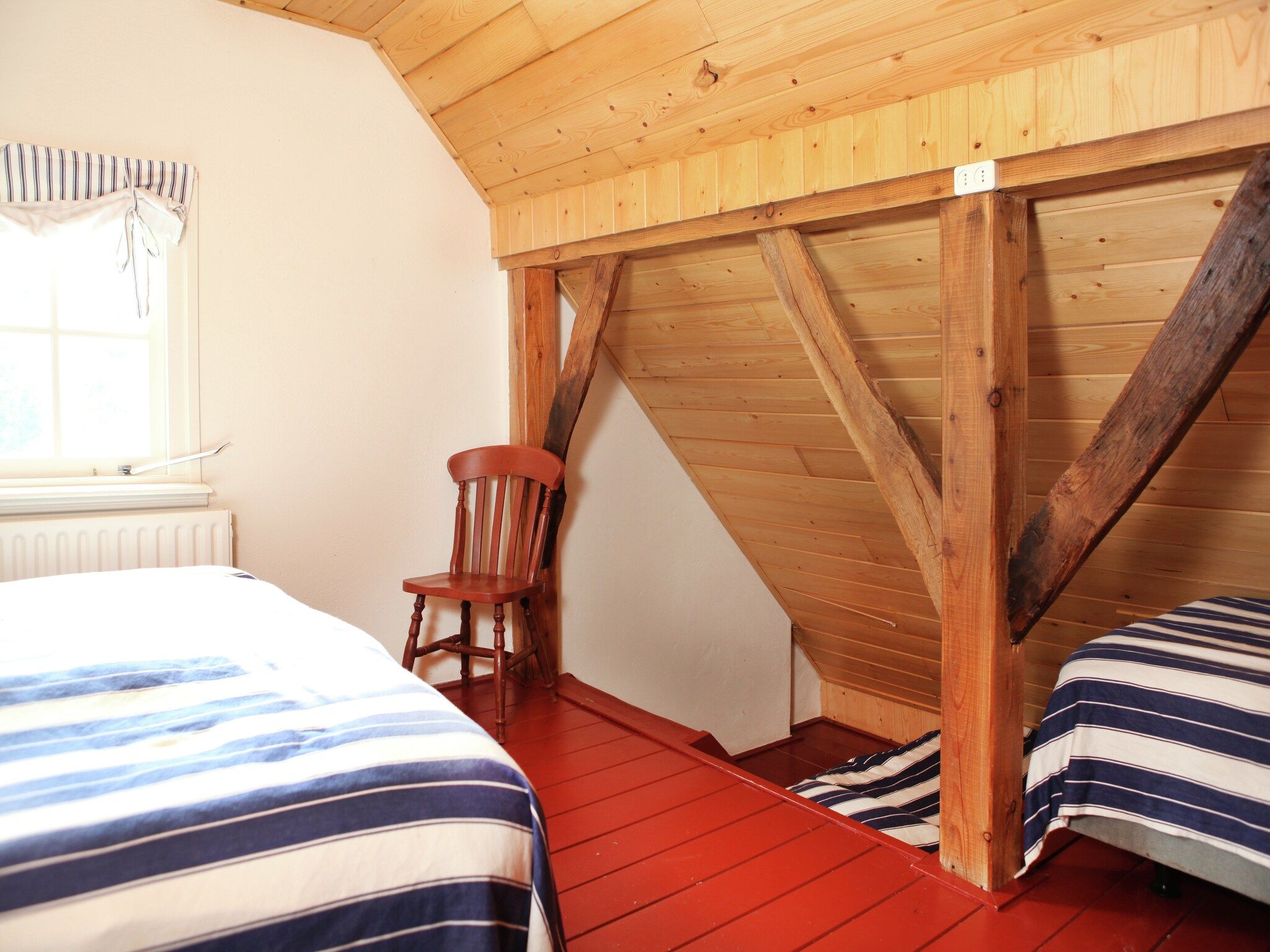 Een slaapkamer van Kotman's spieker 6 persoons in Enschede