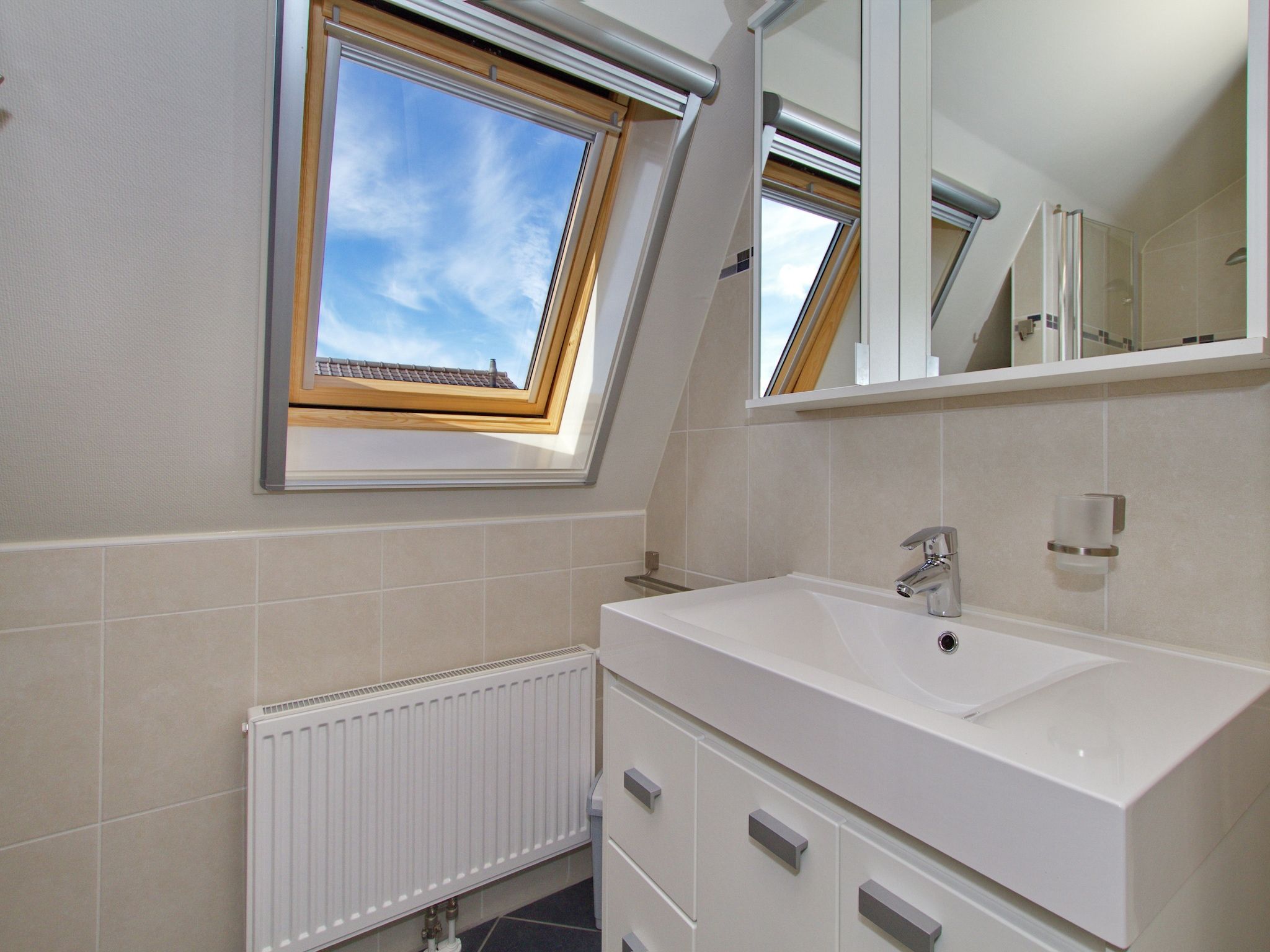 De badkamer van Vakantiepark Duinrust 1 in Noordwijk aan zee