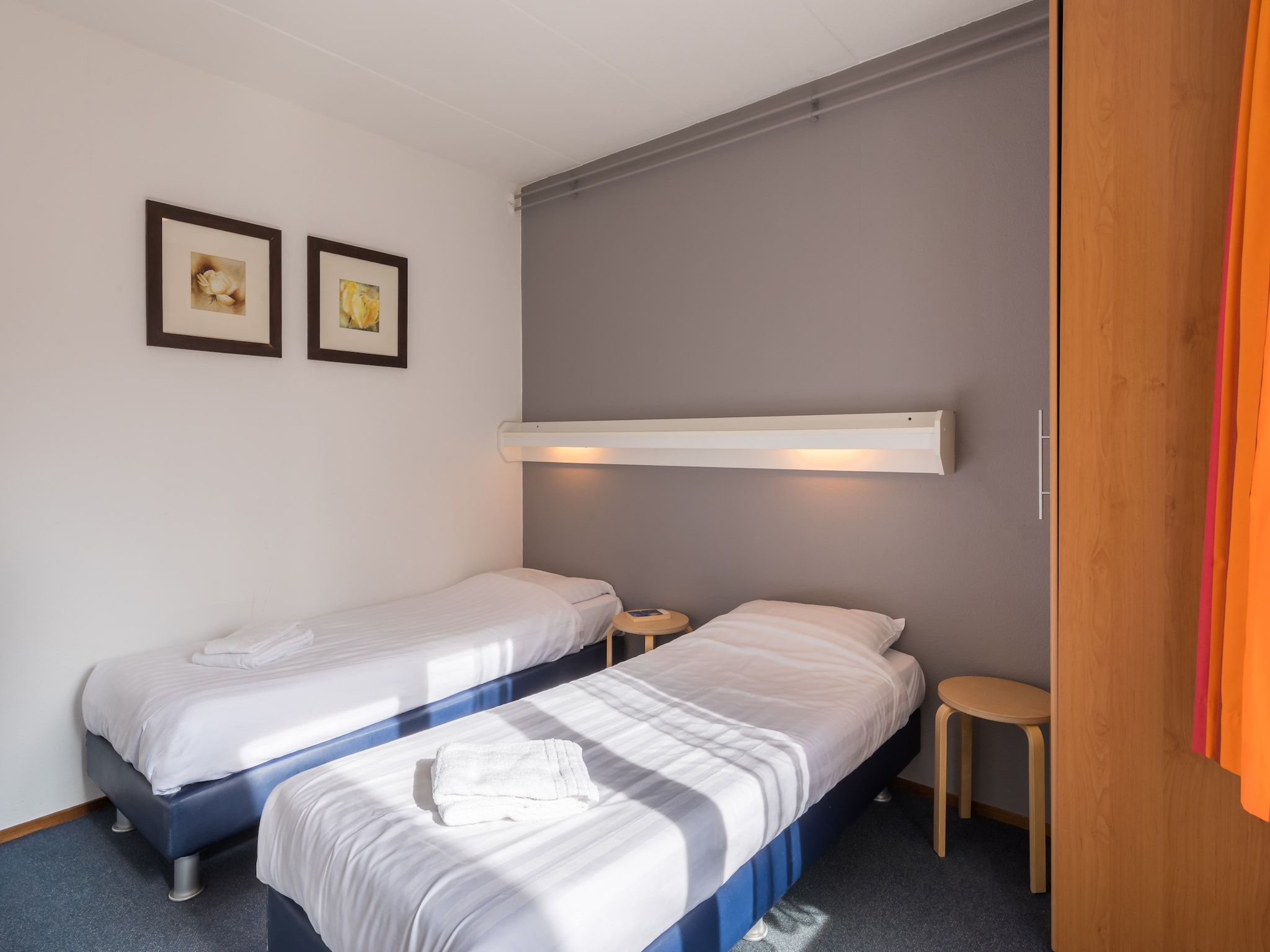 Een slaapkamer van Vakantiepark Hunzedal 6 in Borger