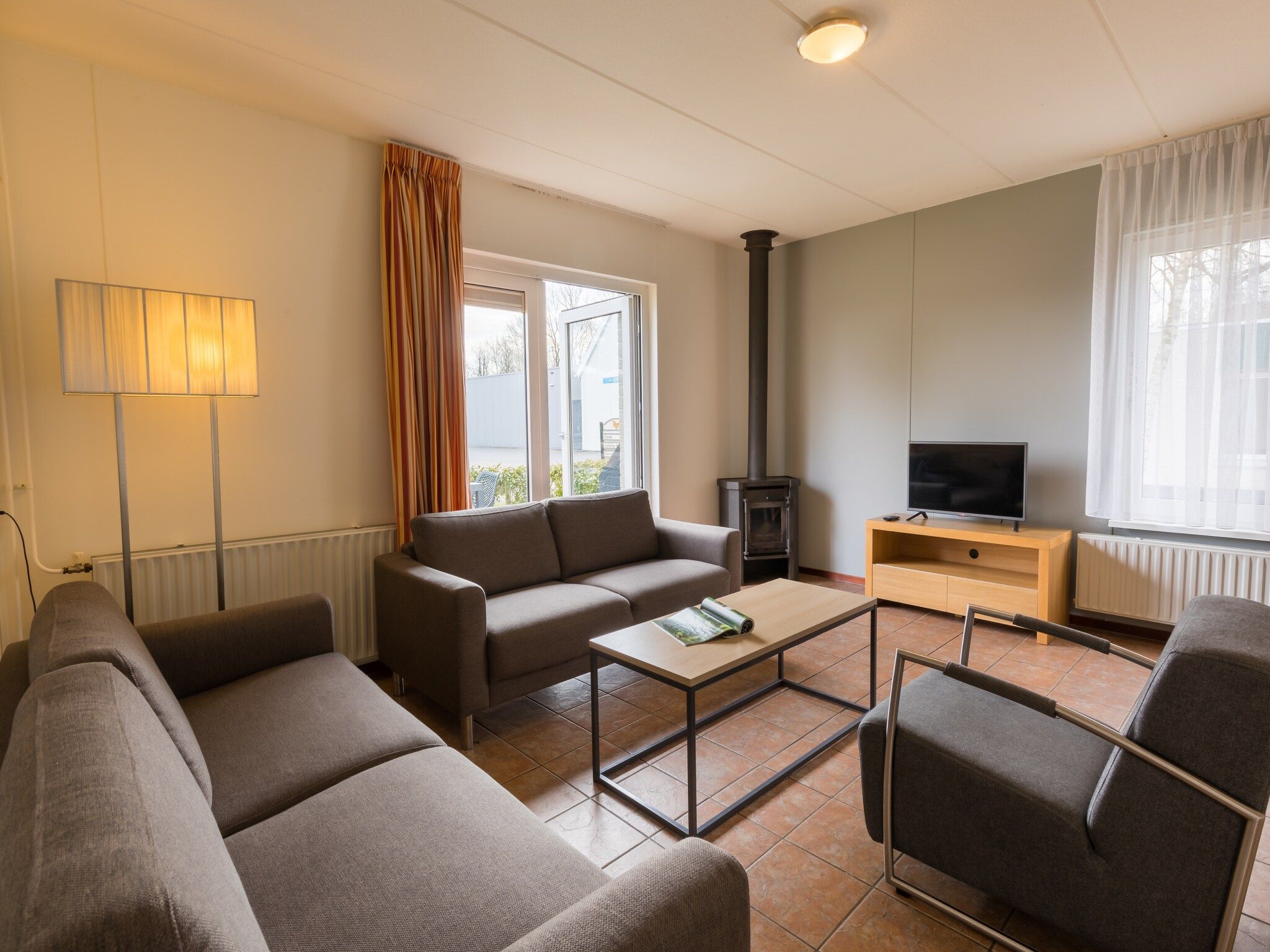 De woonkamer van Vakantiepark Hunzedal 4 in Borger