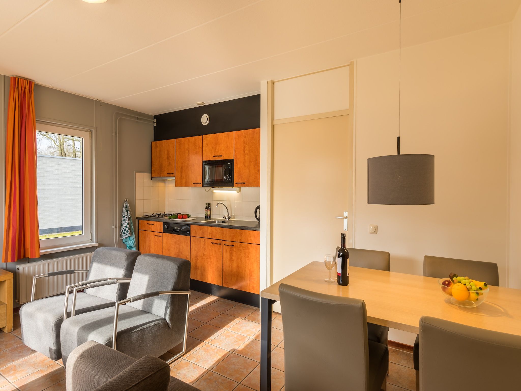 De woonkamer van Vakantiepark Hunzedal 5 in Borger