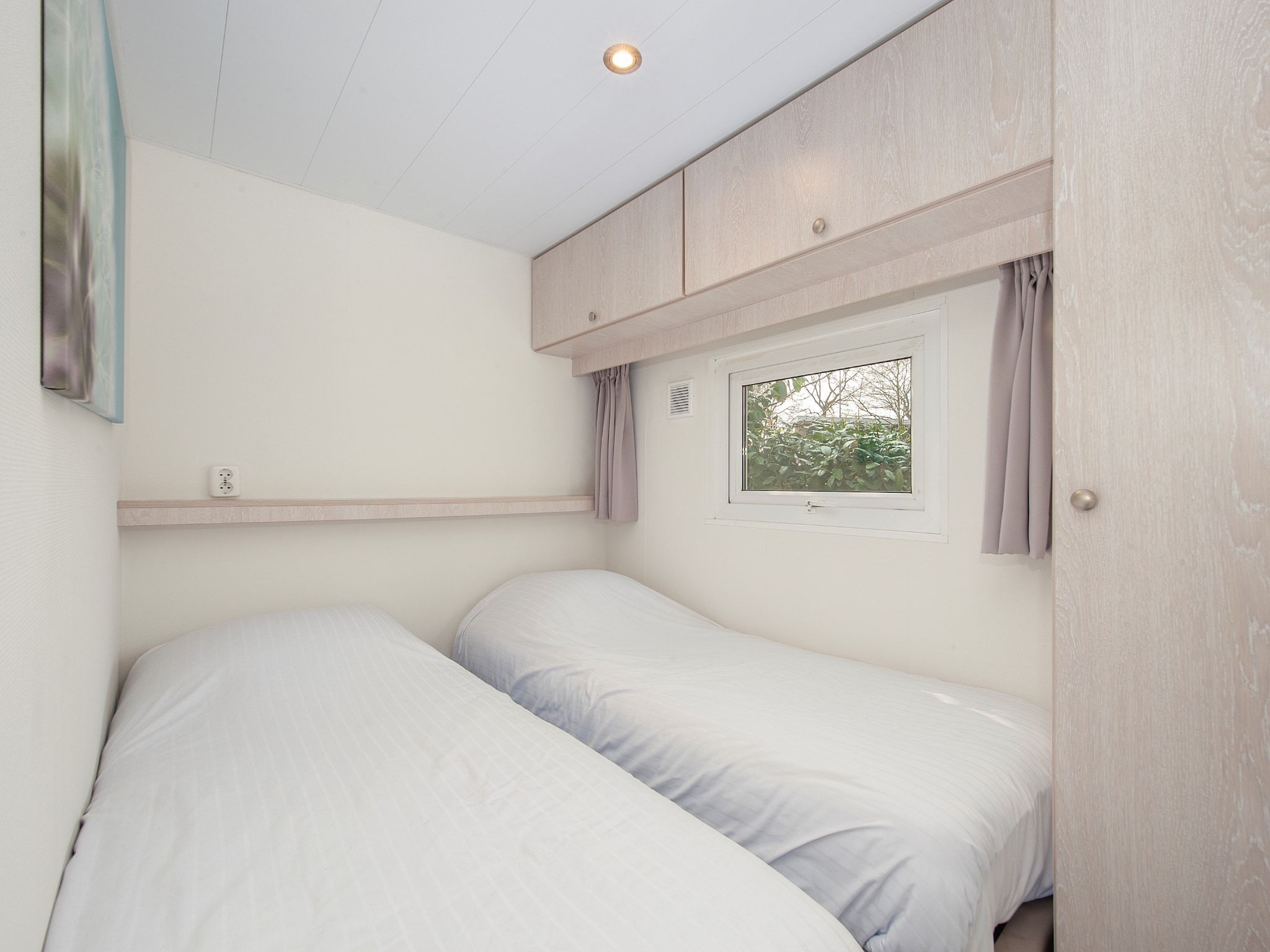 Een slaapkamer van Resort Arcen 15 in Arcen