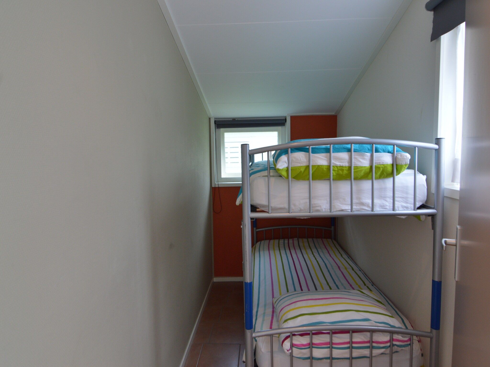 Een slaapkamer van Singelhoeve in Fochteloo