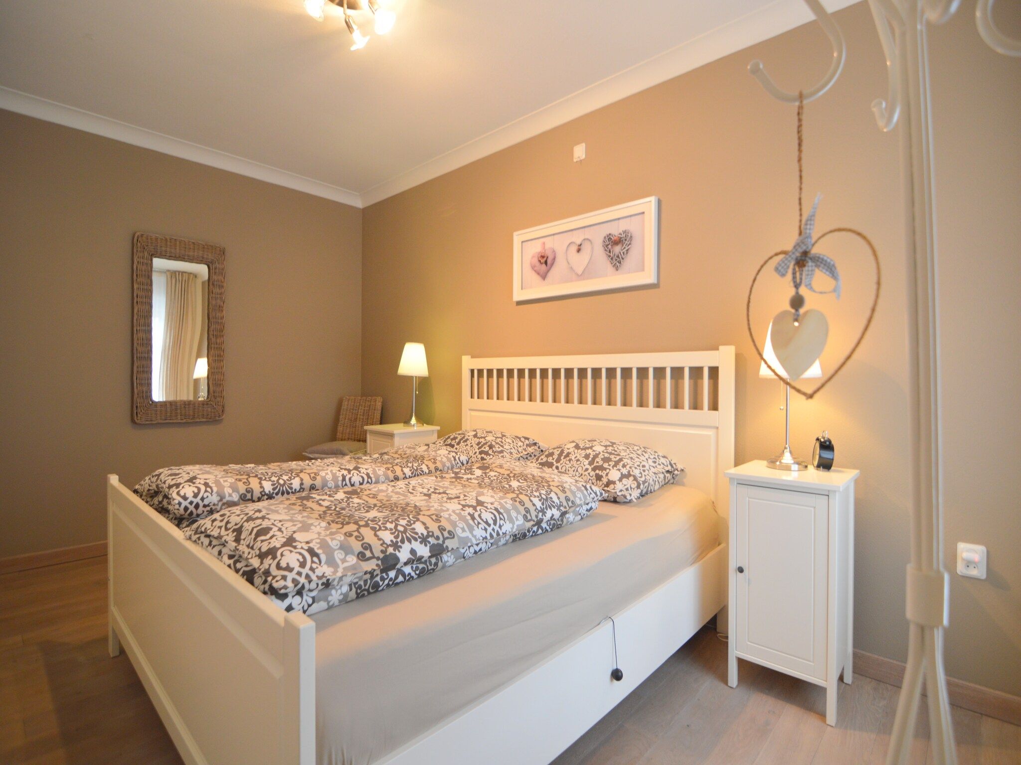 Een slaapkamer van Maasheuvel in Roosteren