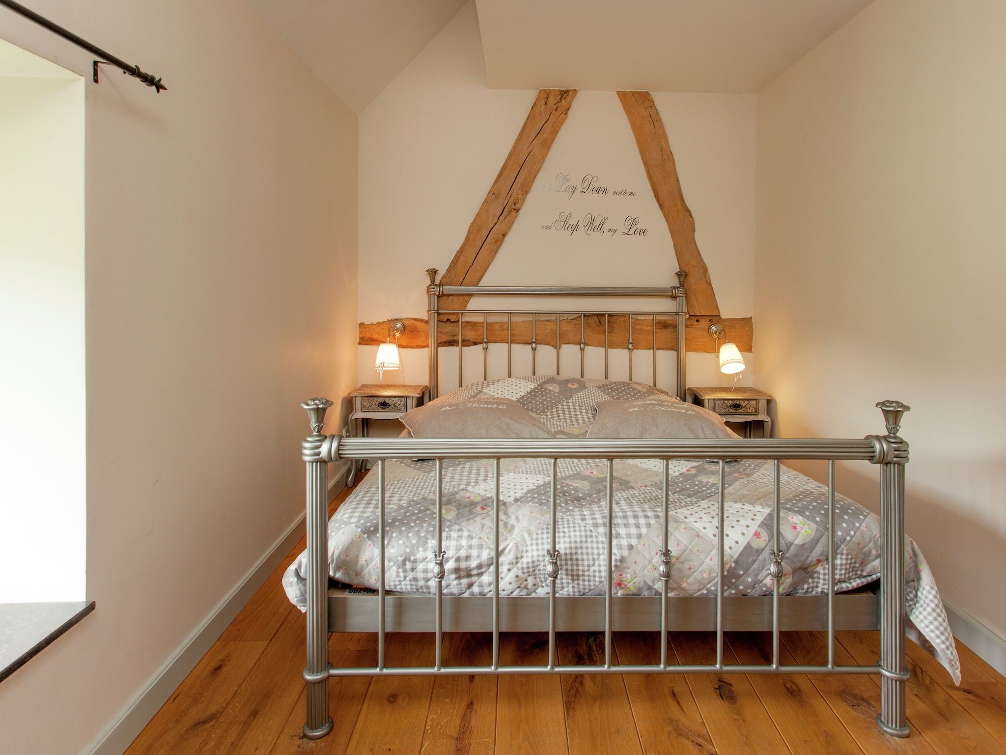 Een slaapkamer van Hoeve A Gen Water - Botterblumke in Slenaken