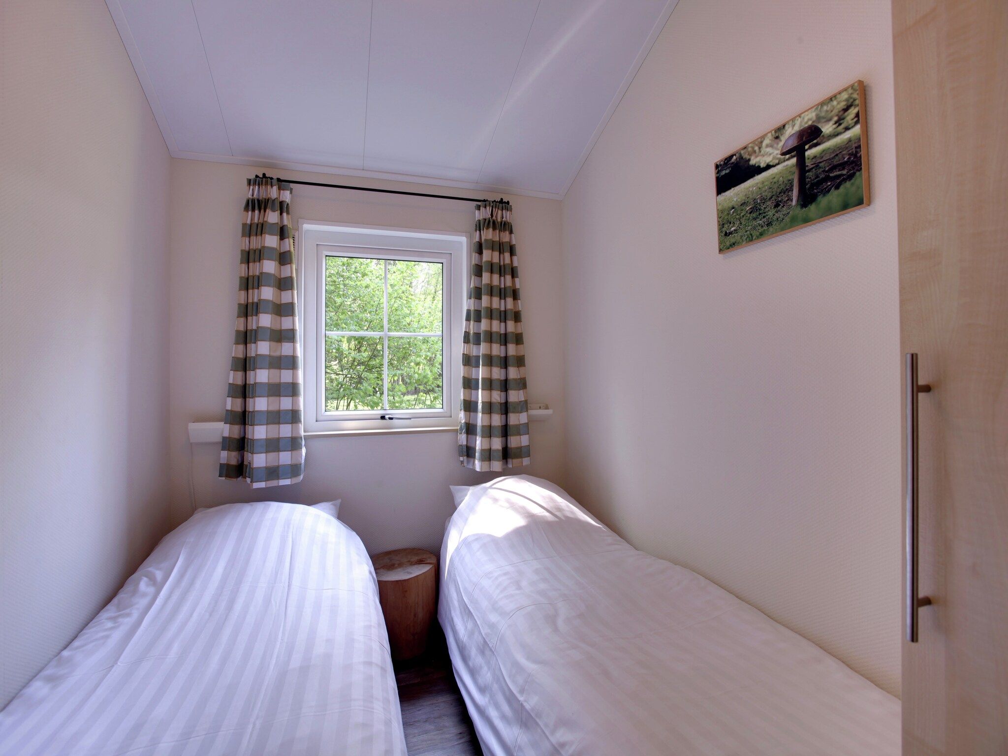 Een slaapkamer van Buitenplaats Gerner 4 in Dalfsen