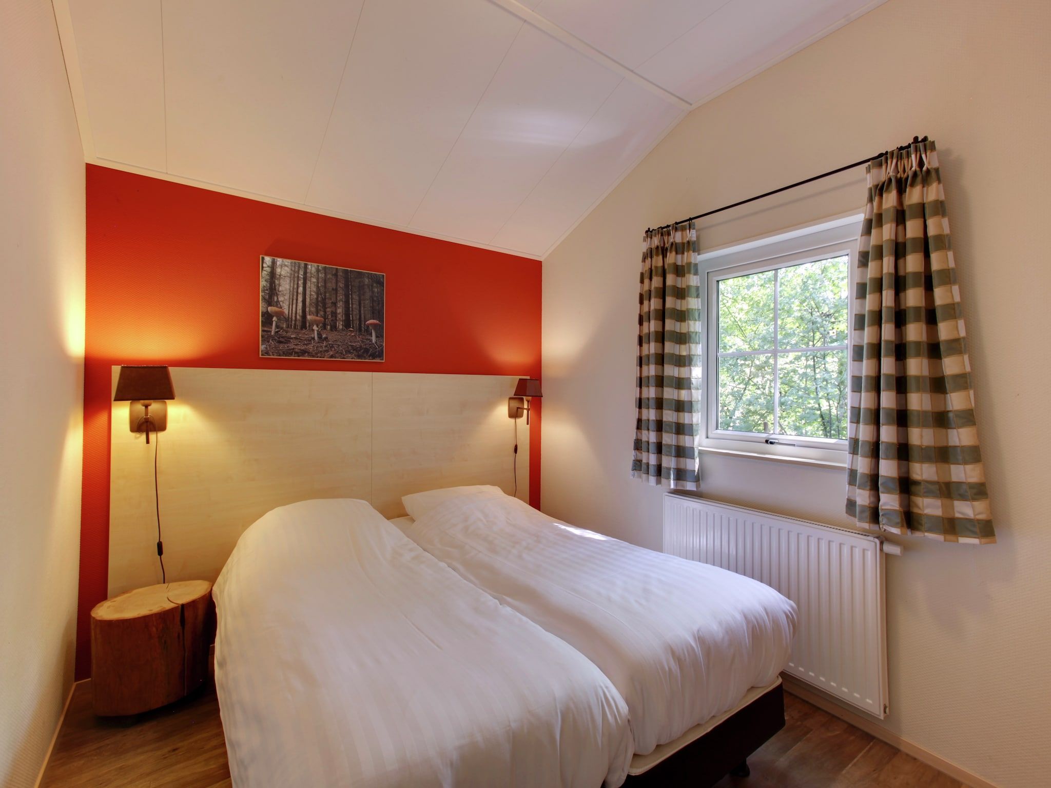 Een slaapkamer van Buitenplaats Gerner 4 in Dalfsen