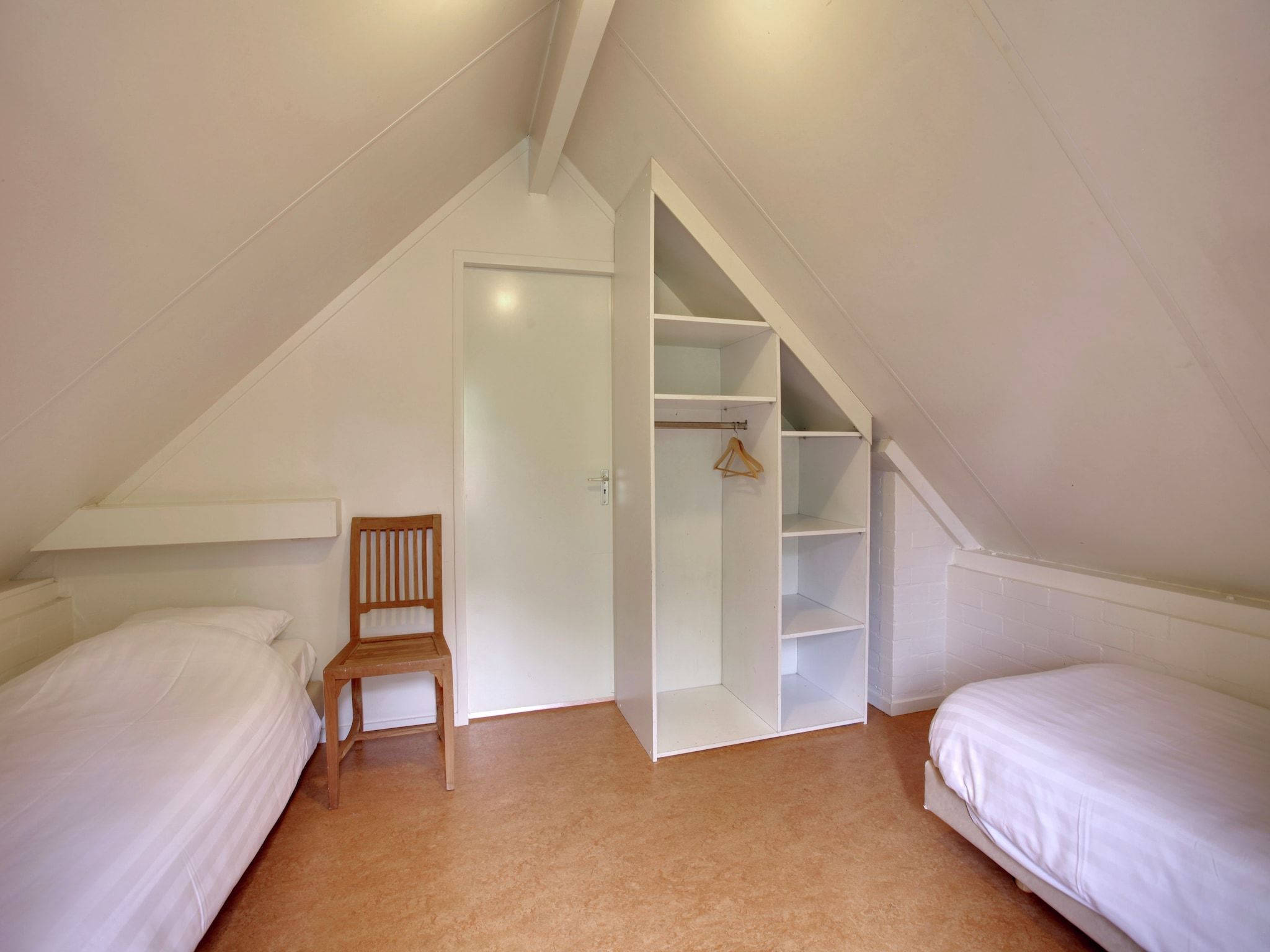 Een slaapkamer van Buitenplaats Gerner 5 in Dalfsen