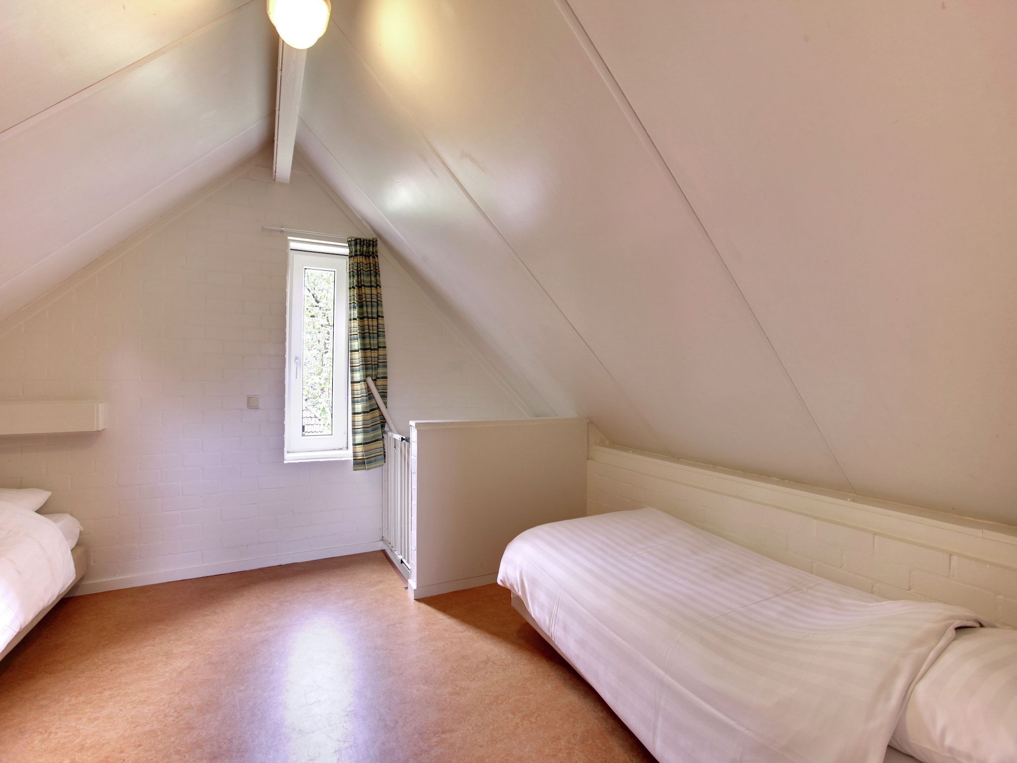 Een slaapkamer van Buitenplaats Gerner 5 in Dalfsen