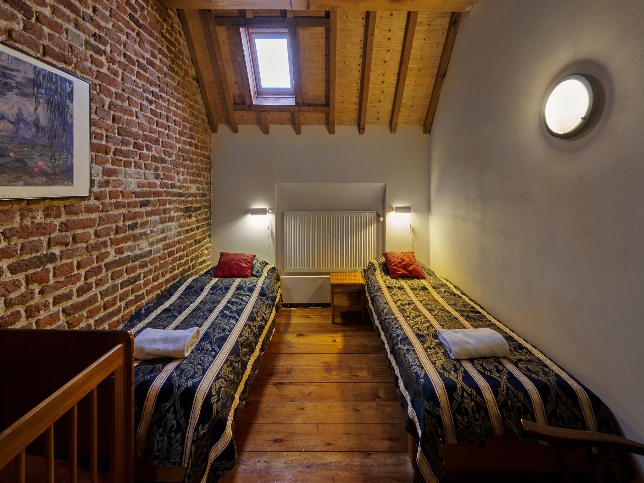 Een slaapkamer van Meschermolen 9 in Mesch-Eijsden