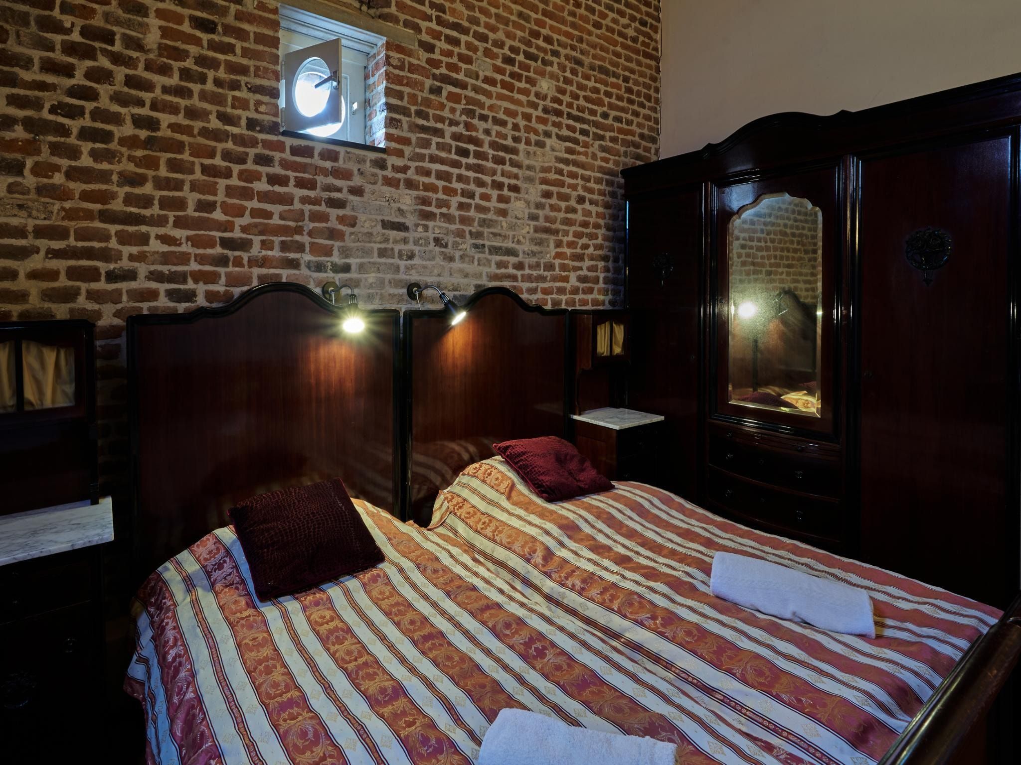 Een slaapkamer van Meschermolen 10 in Mesch-Eijsden