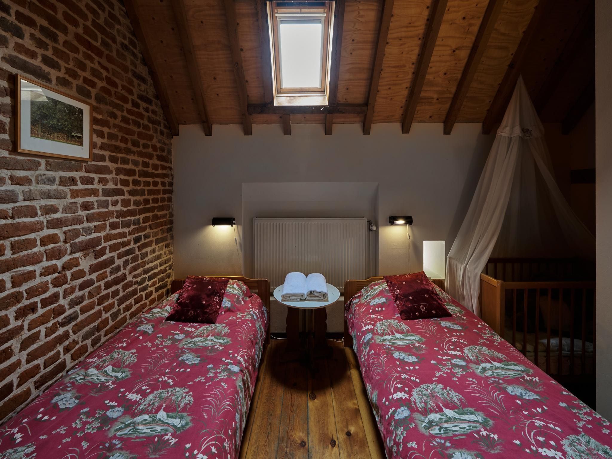 Een slaapkamer van Meschermolen 10 in Mesch-Eijsden