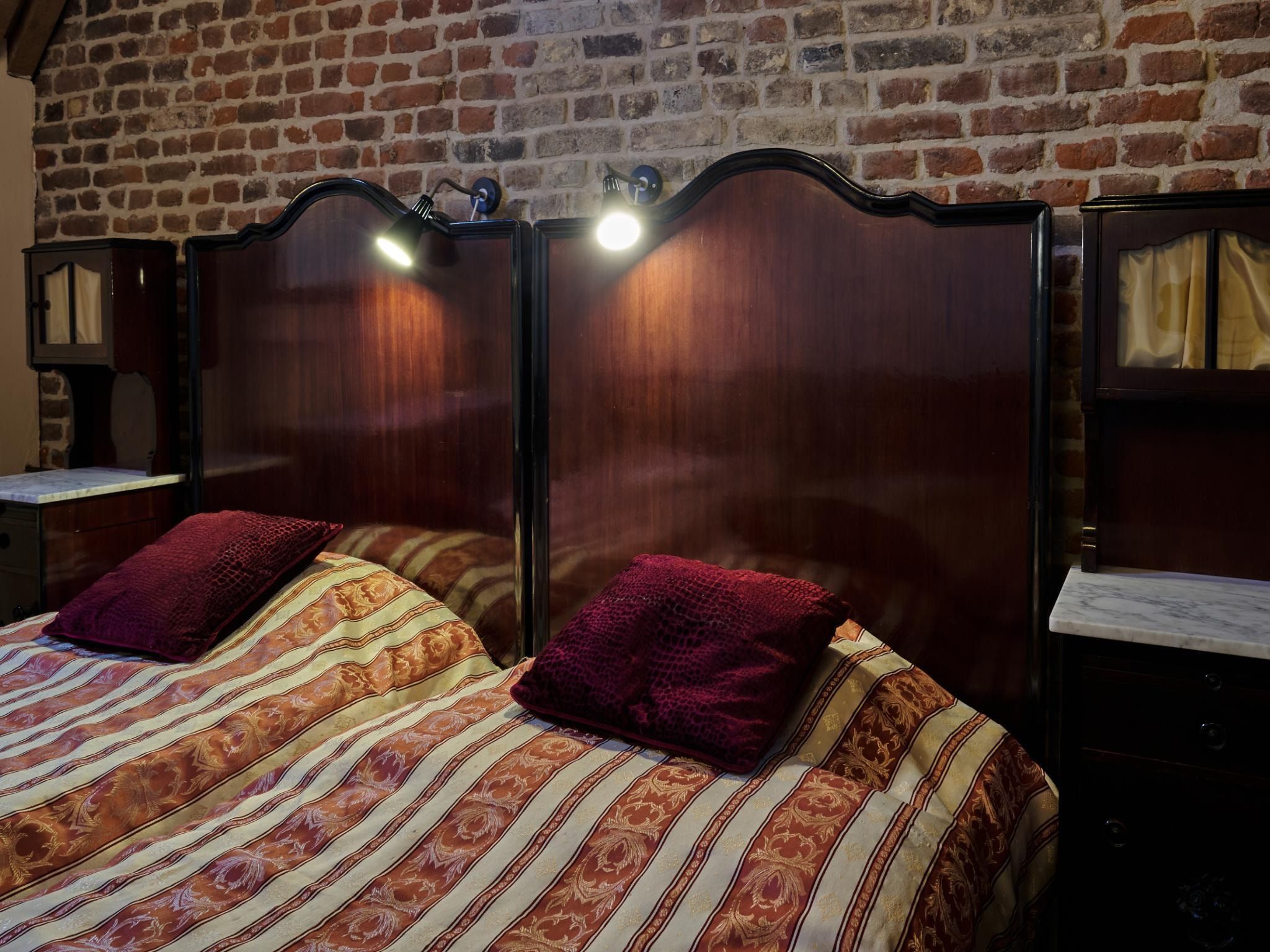 Een slaapkamer van Meschermolen 10 in Mesch-Eijsden