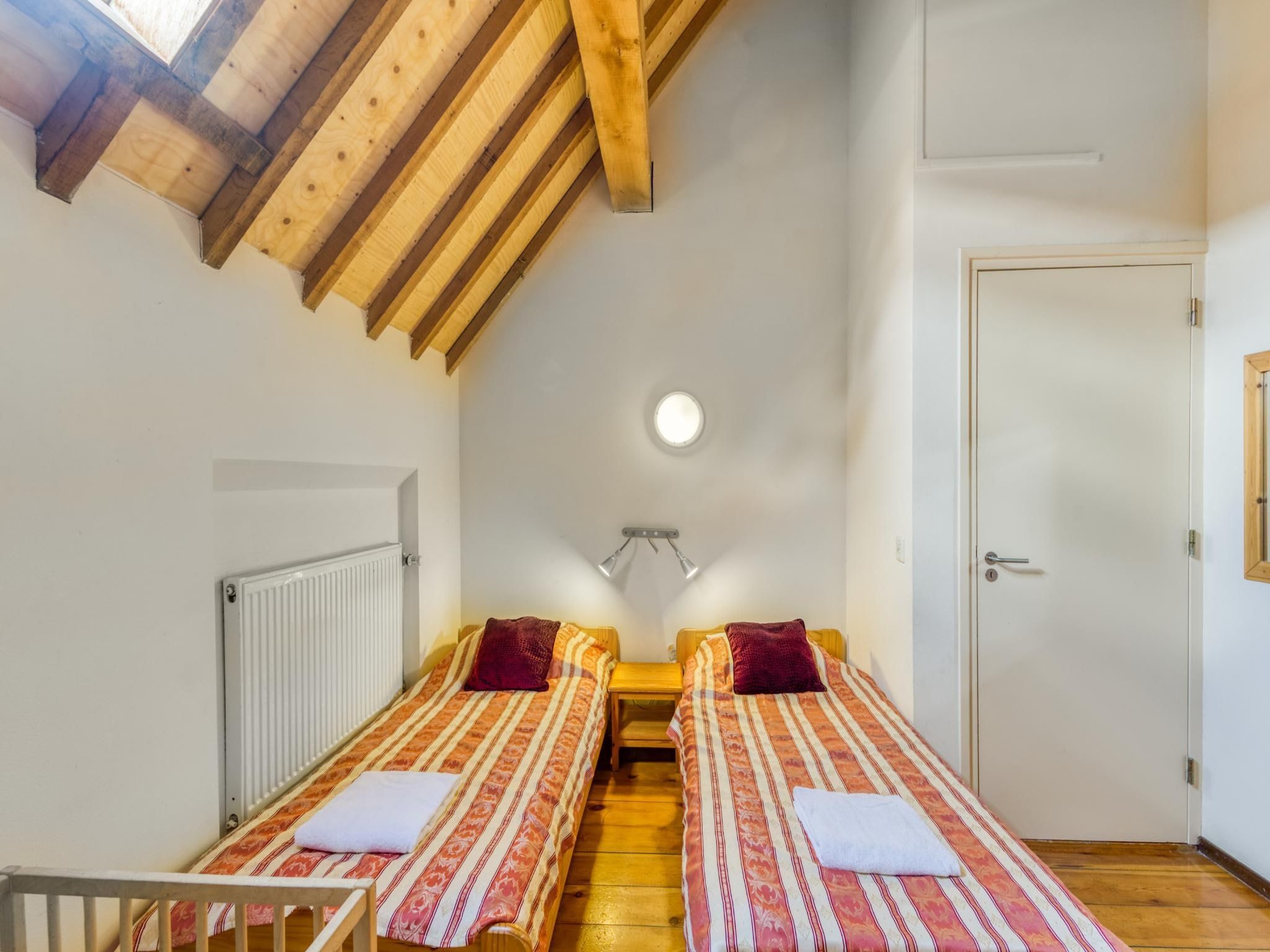 Een slaapkamer van Meschermolen 6 in Mesch-Eijsden