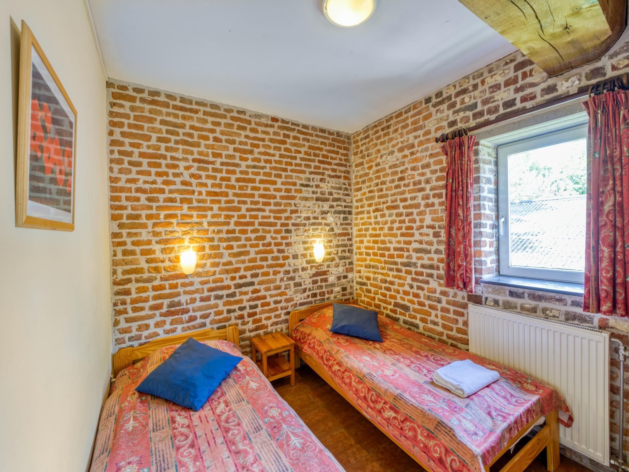 Een slaapkamer van Meschermolen 6 in Mesch-Eijsden