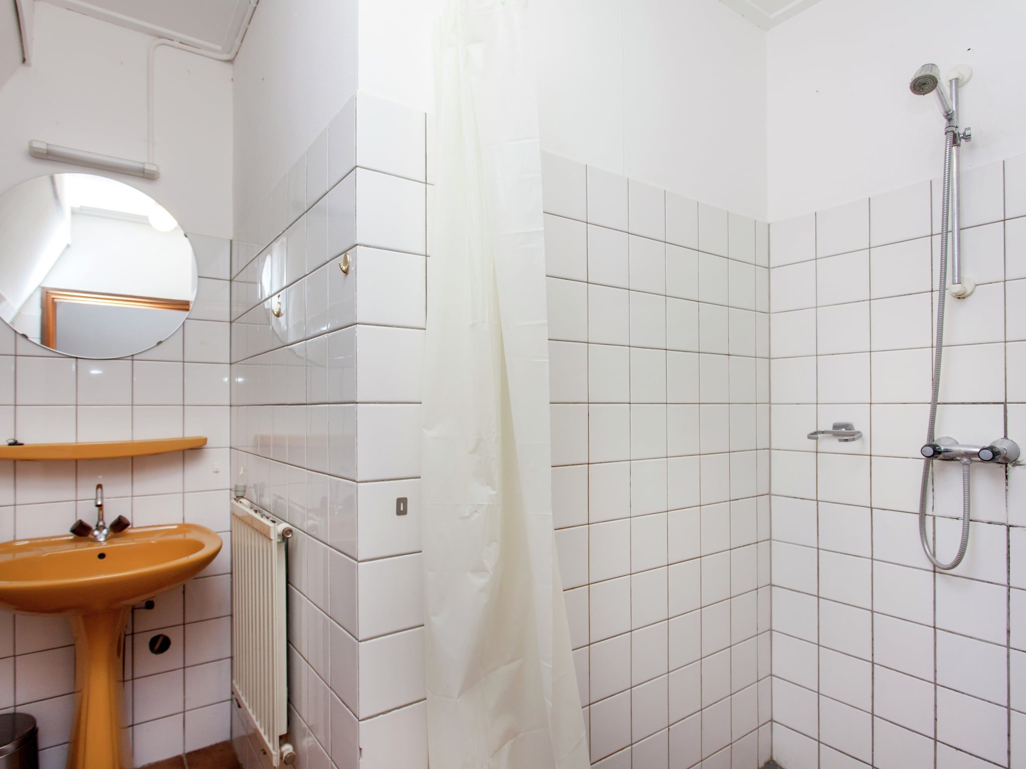 De badkamer van De Vakantie boerderij in Holwerd