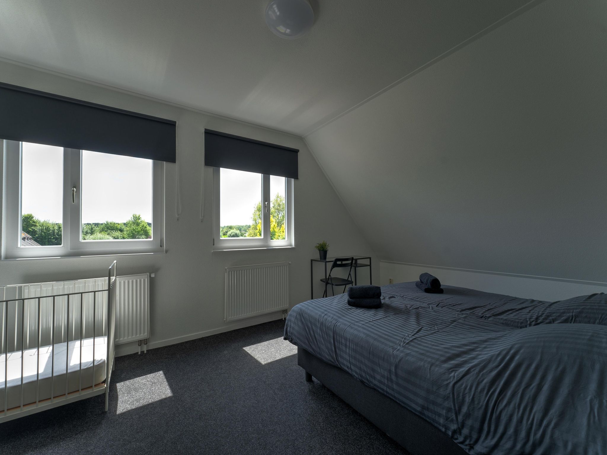 Een slaapkamer van Buitenplaats Enjoy in Zeewolde