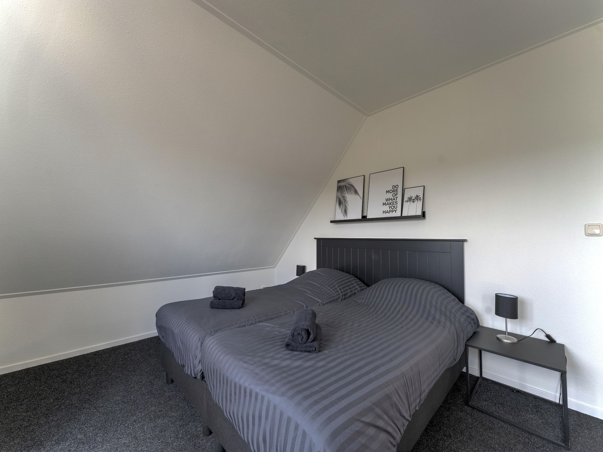 Een slaapkamer van Buitenplaats Enjoy in Zeewolde