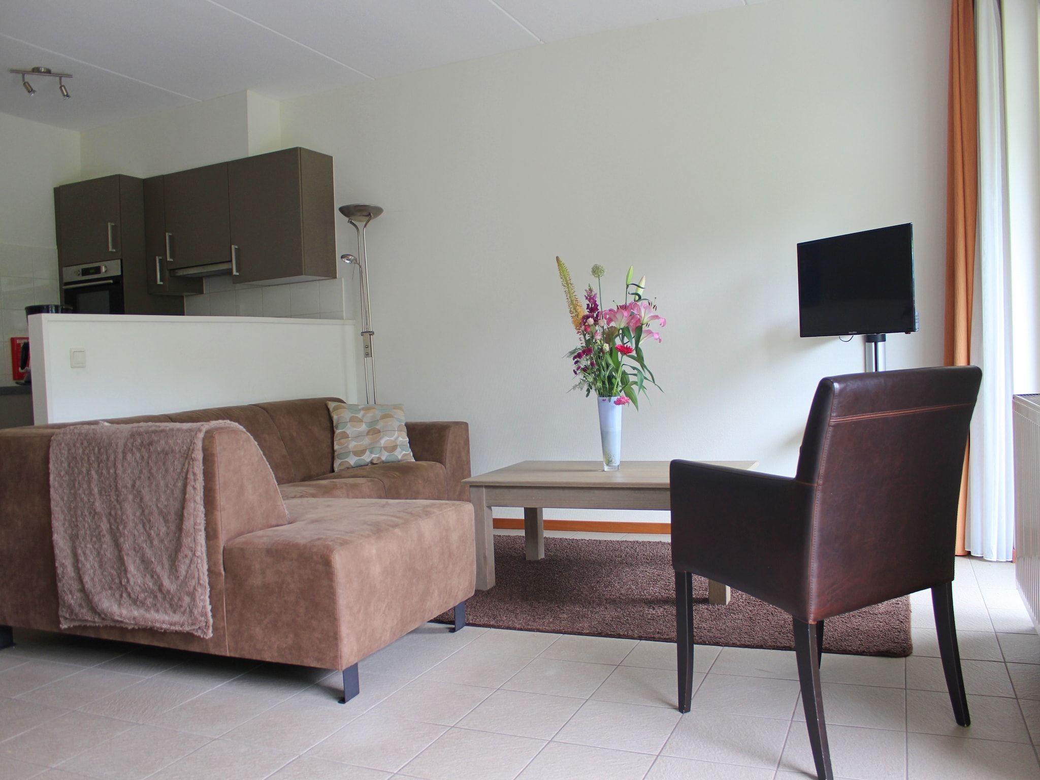 De woonkamer van Vakantiepark Horsetellerie 1 in Hardenberg (rheezerveen)