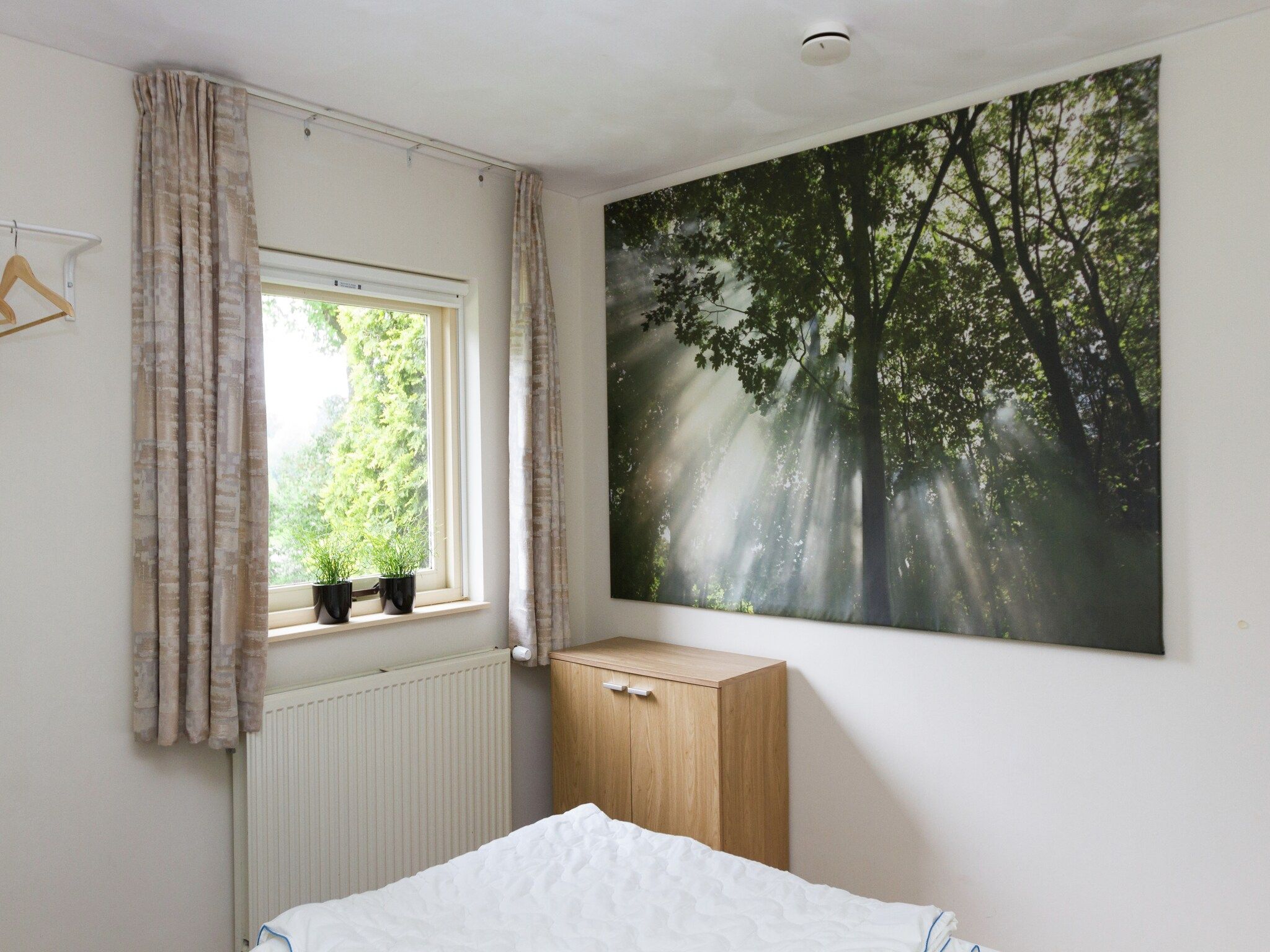 Een slaapkamer van de Lansert in Vessem