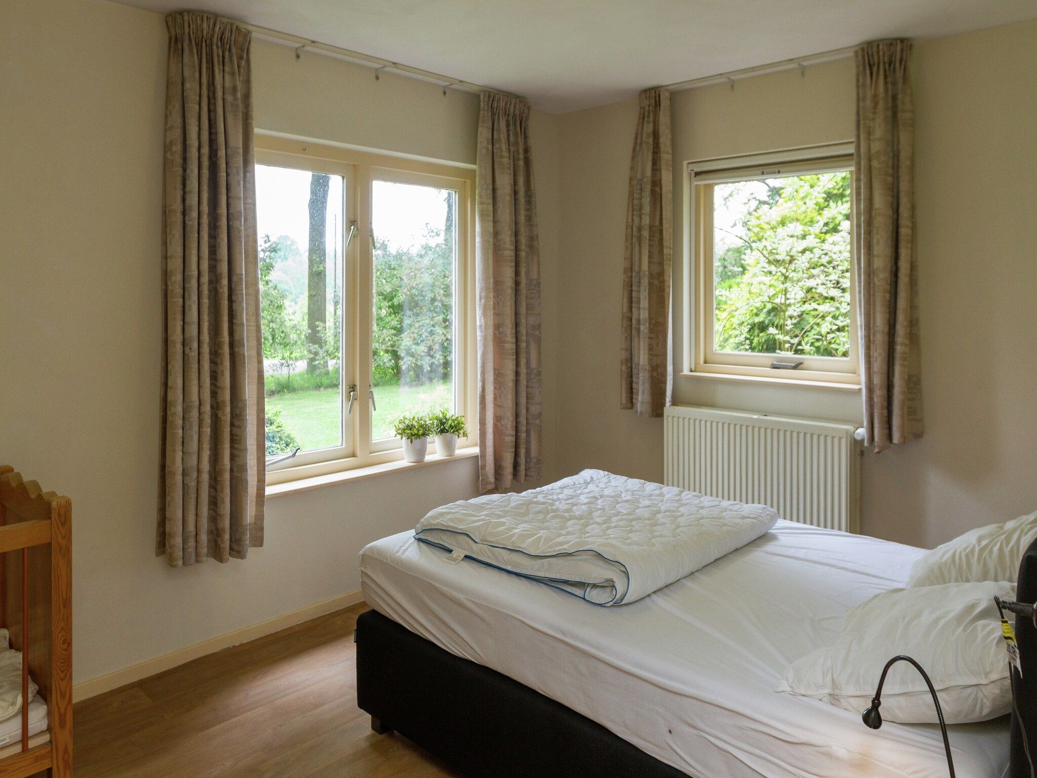 Een slaapkamer van de Lansert in Vessem