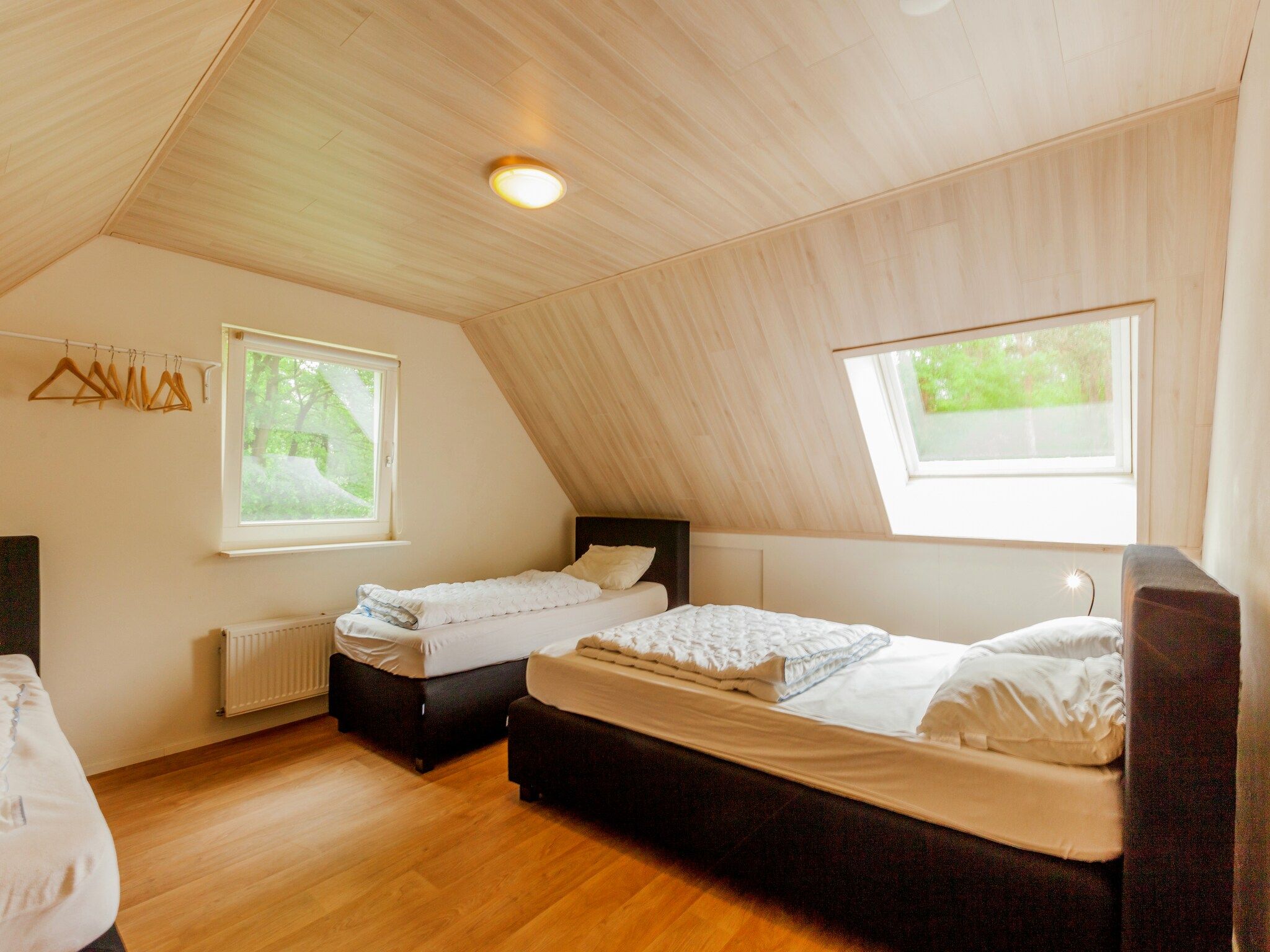 Een slaapkamer van de Lansert in Vessem