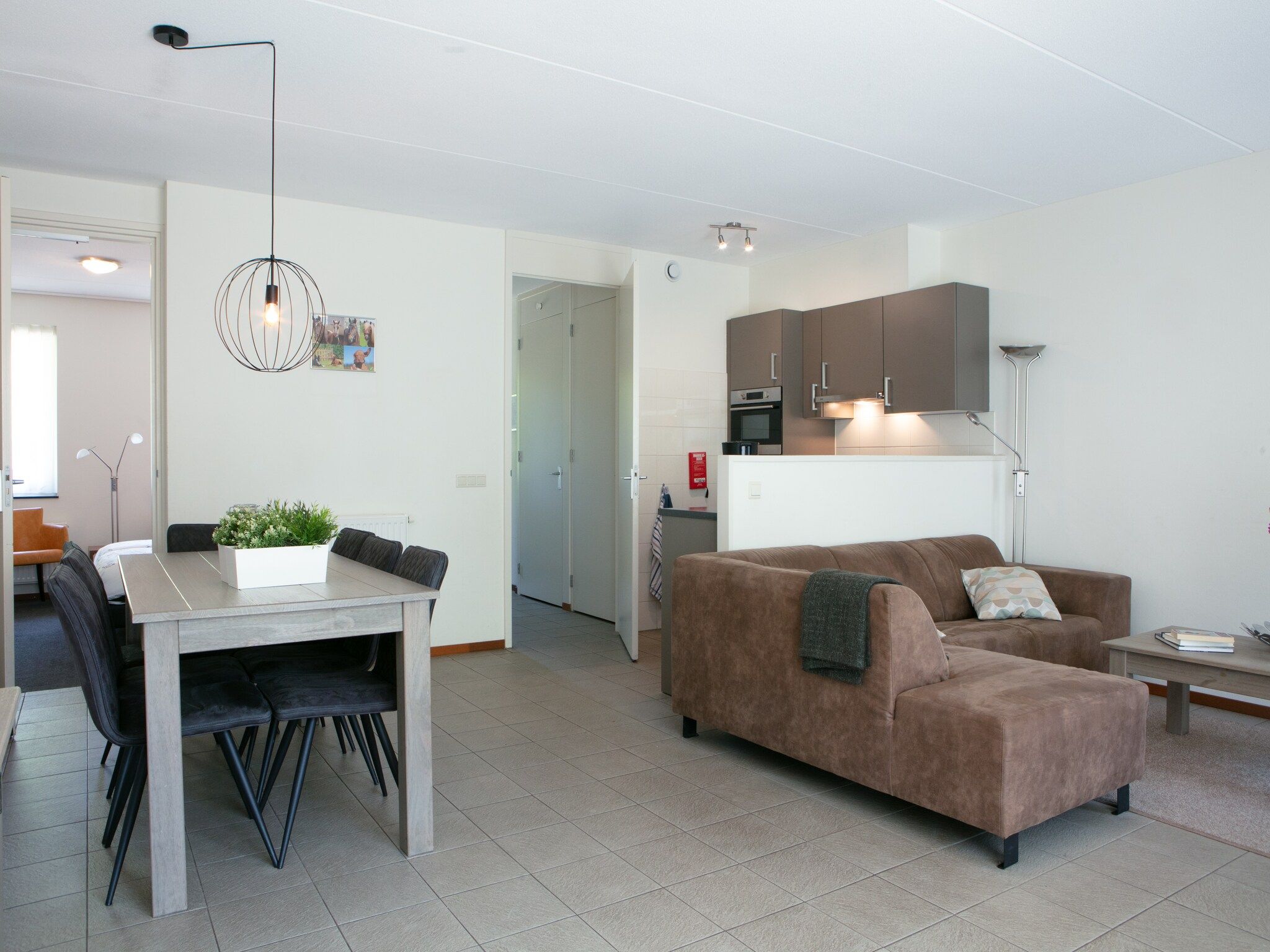De woonkamer van Vakantiepark Horsetellerie 7 in Hardenberg (rheezerveen)